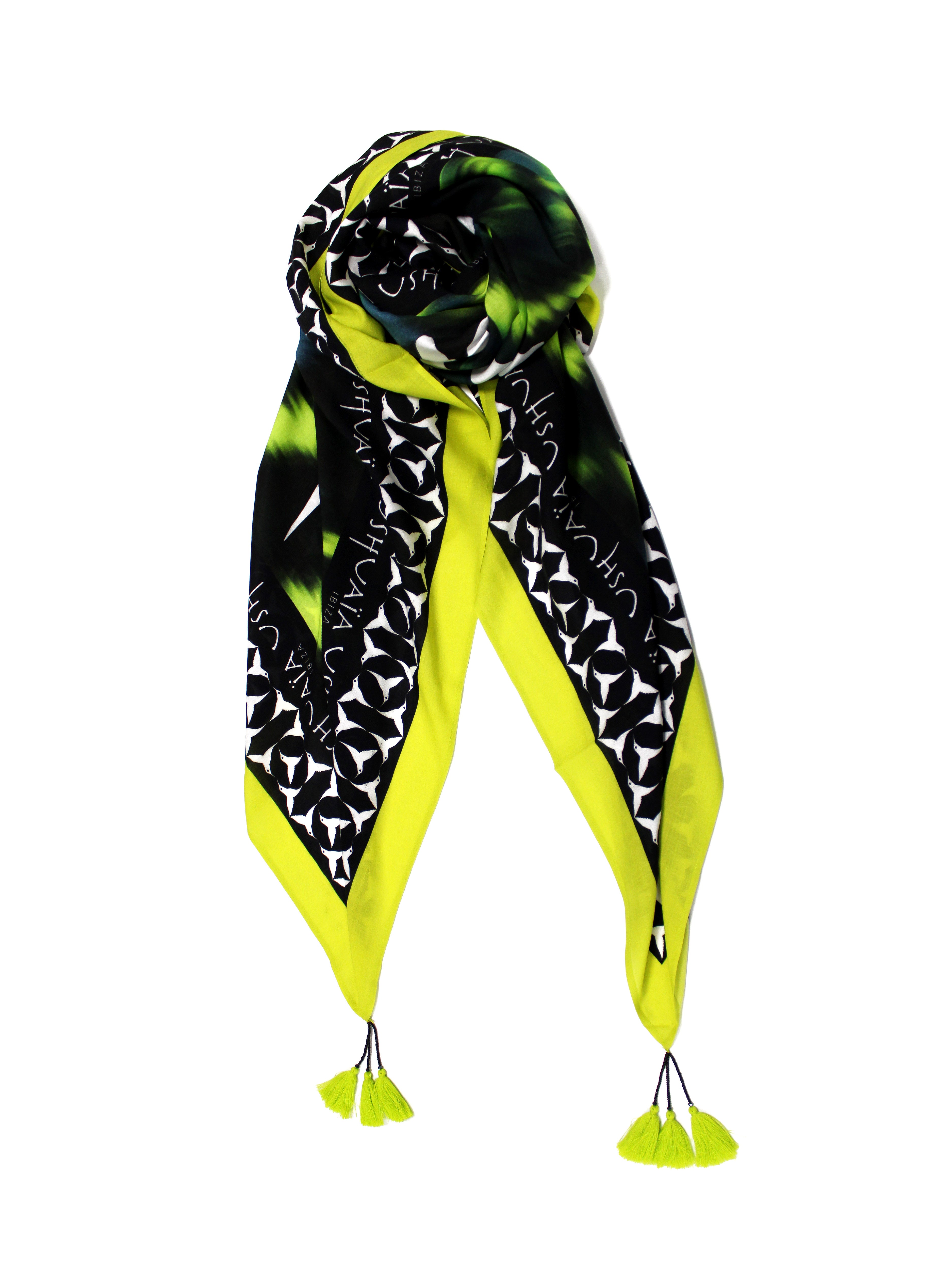 Contrasted sarong with combined print. Decorative tassel detail at the ends.