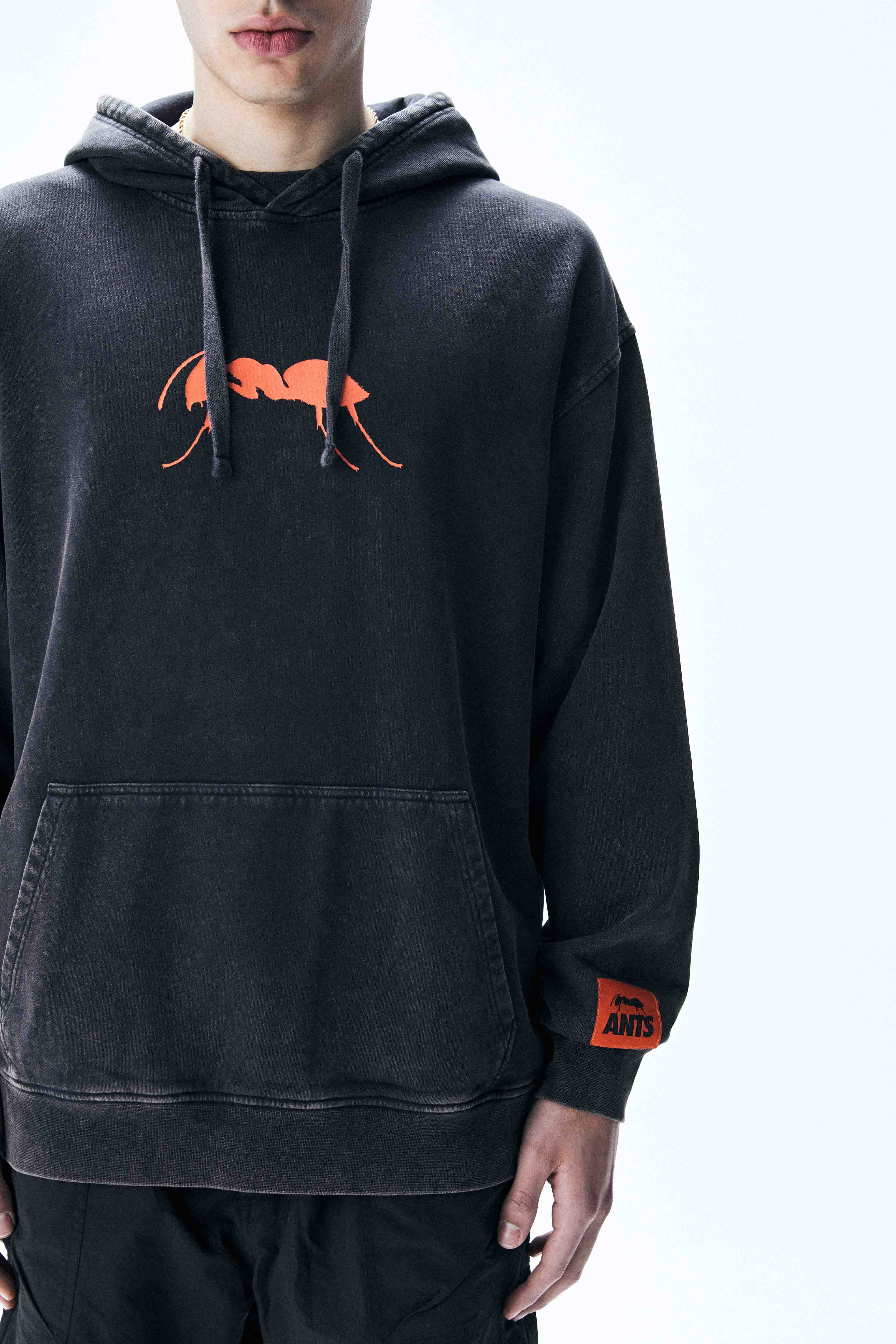 Oversized hoodie with faded-effect sleeves, bold prints, and ribbed trims. 100% cotton comfort for standout Ibiza style.