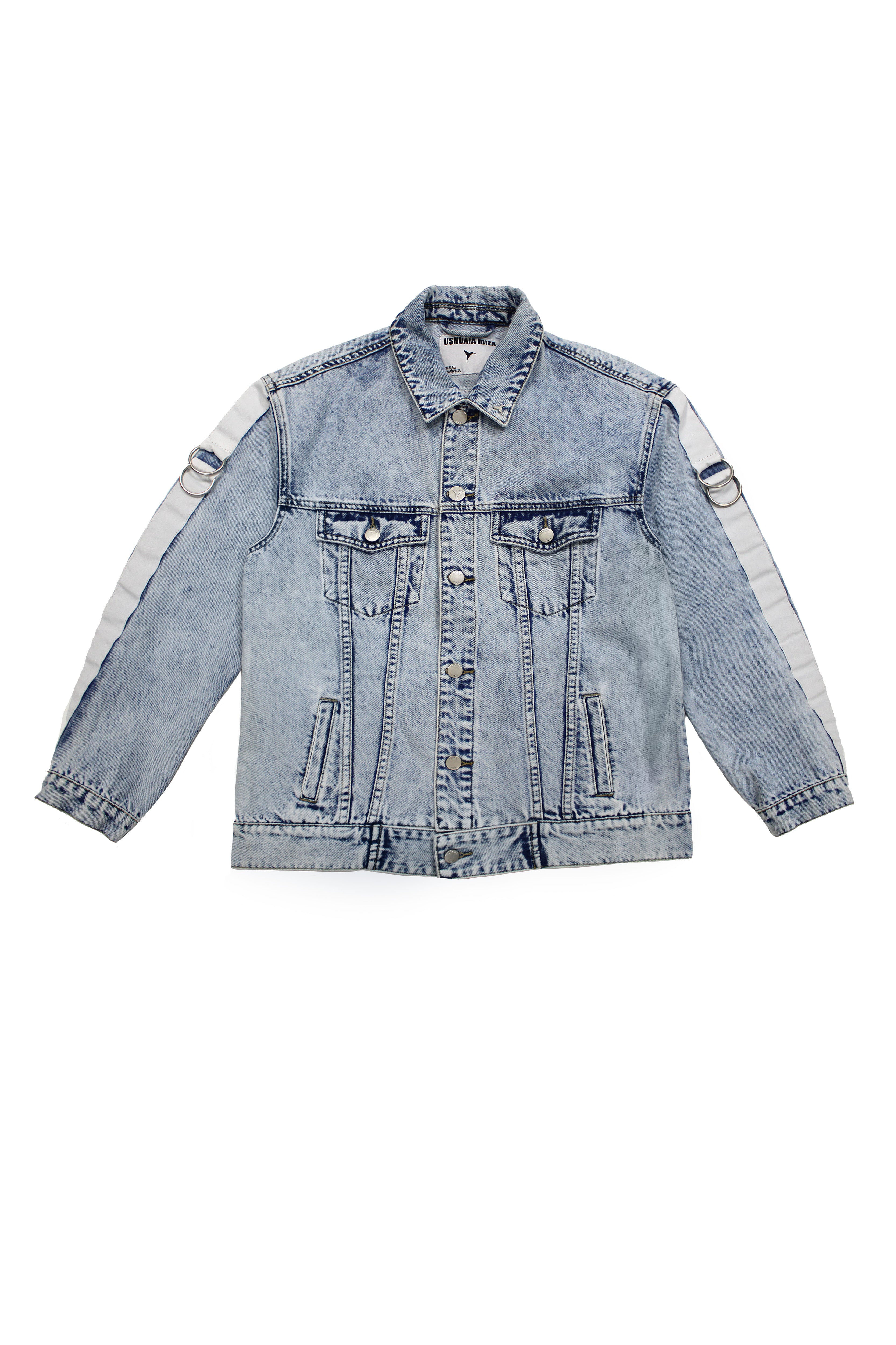 Denim jacket with a back panel featuring an appliqué with applied text and embroidery. Side sleeve panel embroidered with silver eyelet finish.