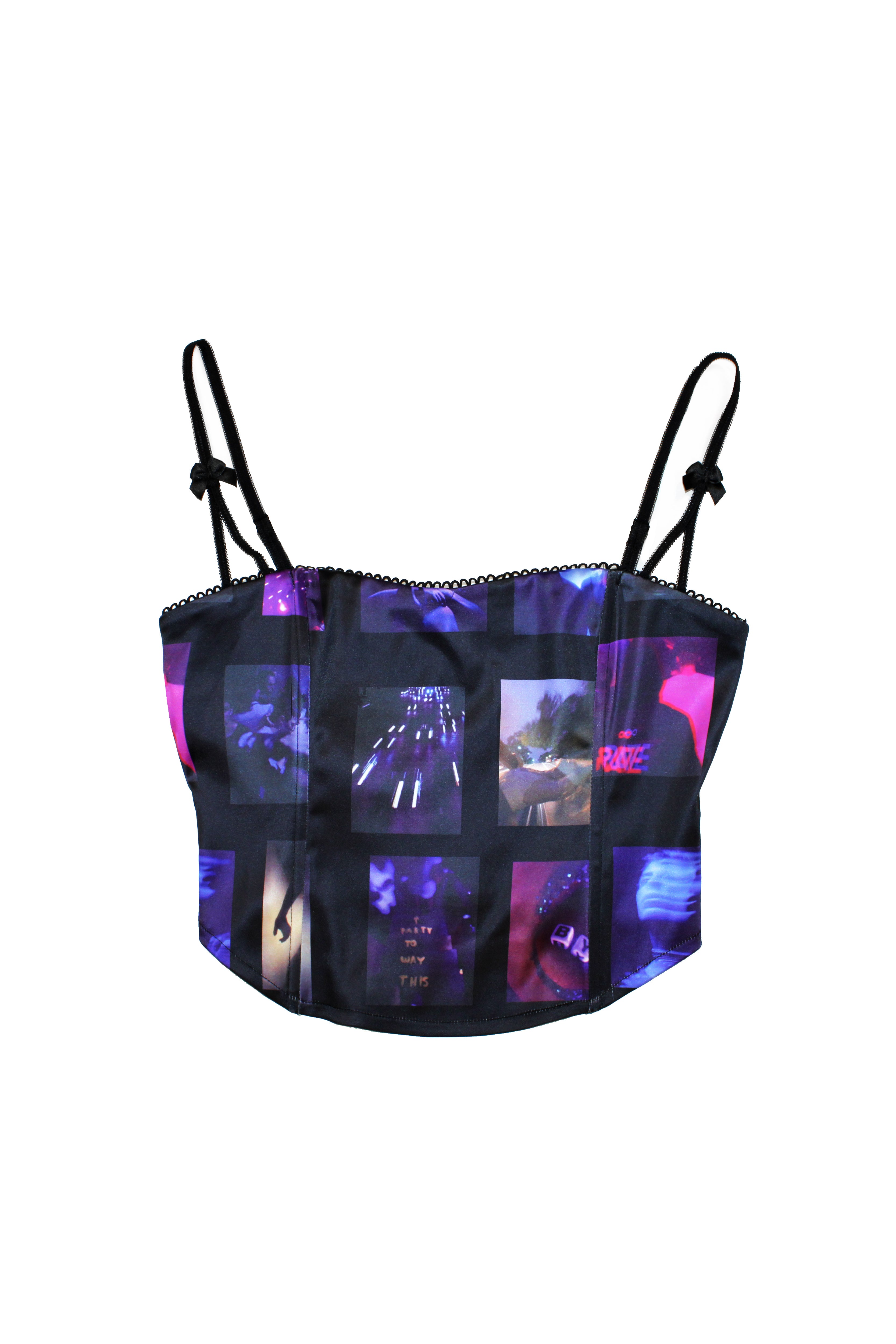 Printed tank top with corset cut and adjustable straps. Central zipper detail on the back.