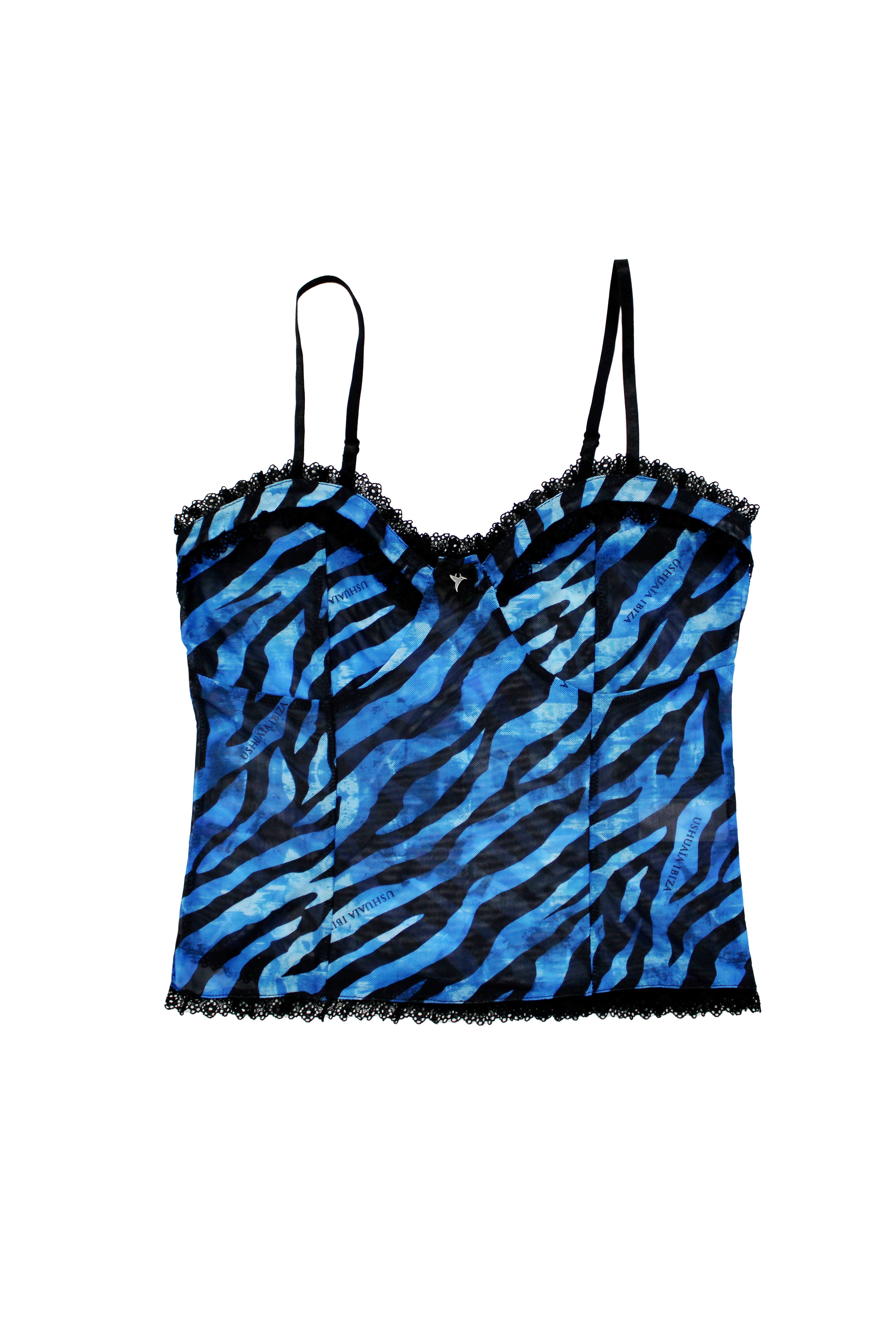 Printed tank top with corset cut and adjustable straps. Lace detail and bow with metallic ornament.