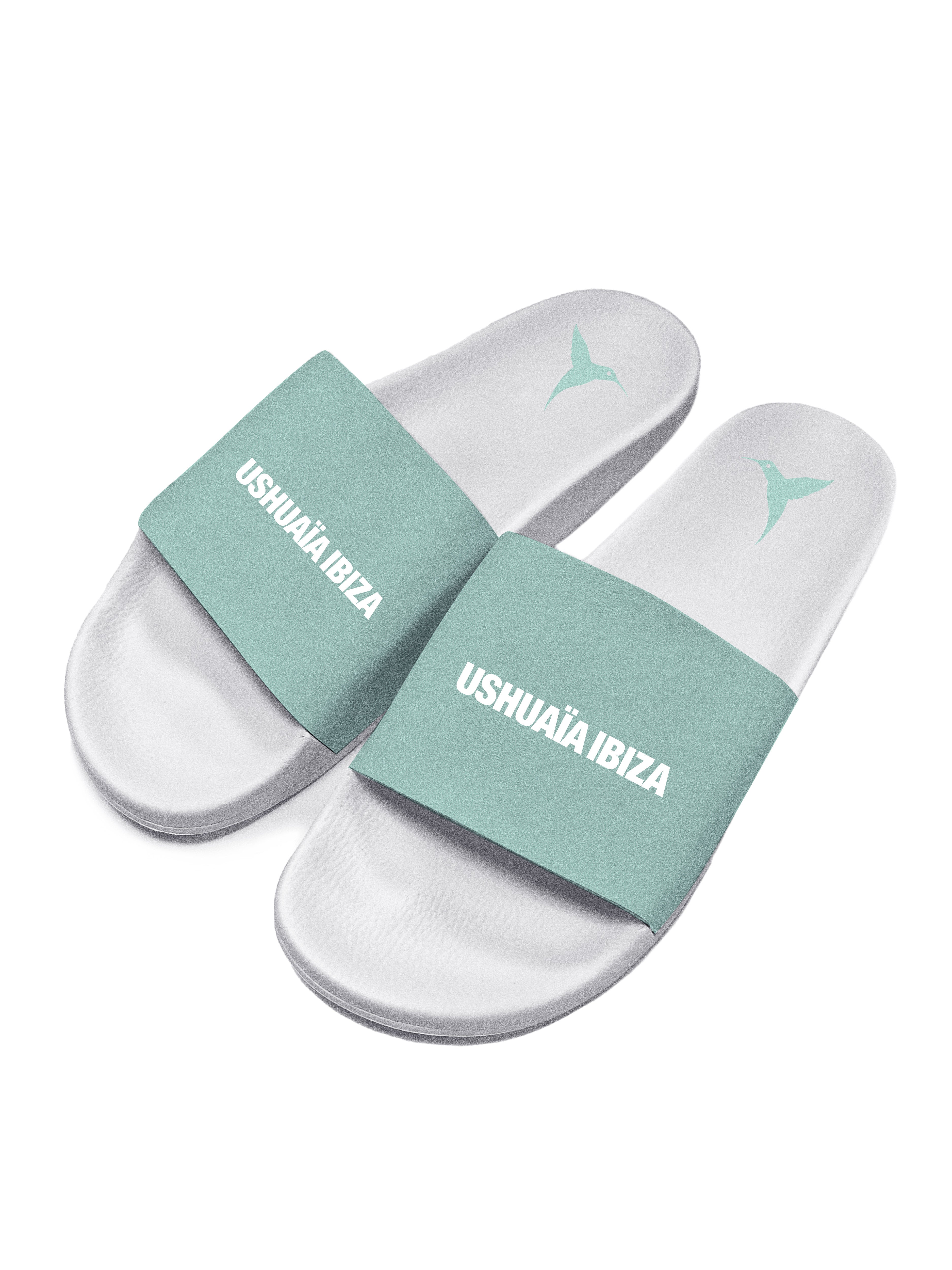Sky blue flip flops with white logo.Polyurethane sole with cotton and polyester lining.Screen printing and engraving in high frecuency