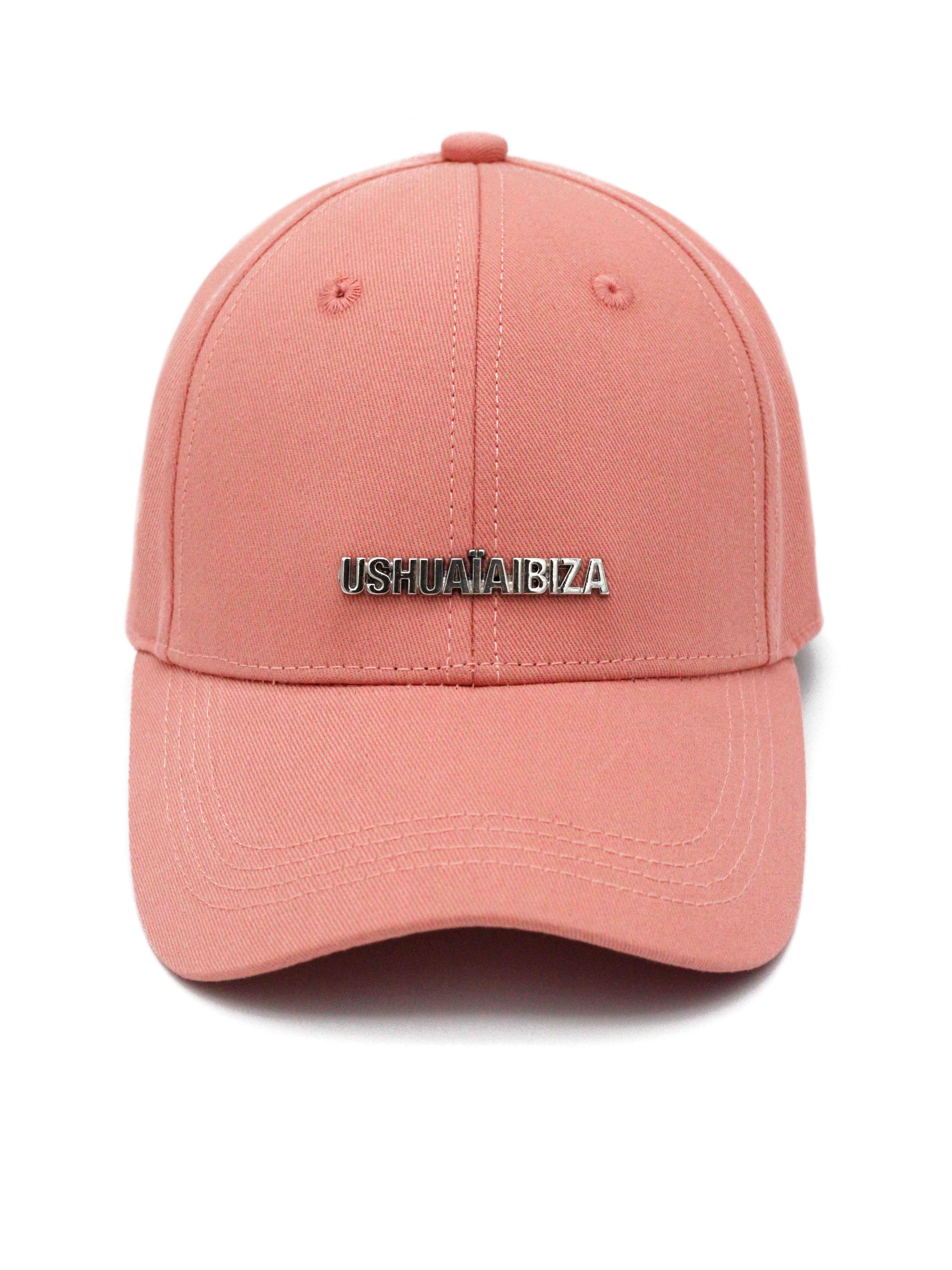Ushuaïa Pink Plate Cap made of 100% cotton with exclusive metallic logo detail. Adjustable back strap and style inspired by Ibiza.