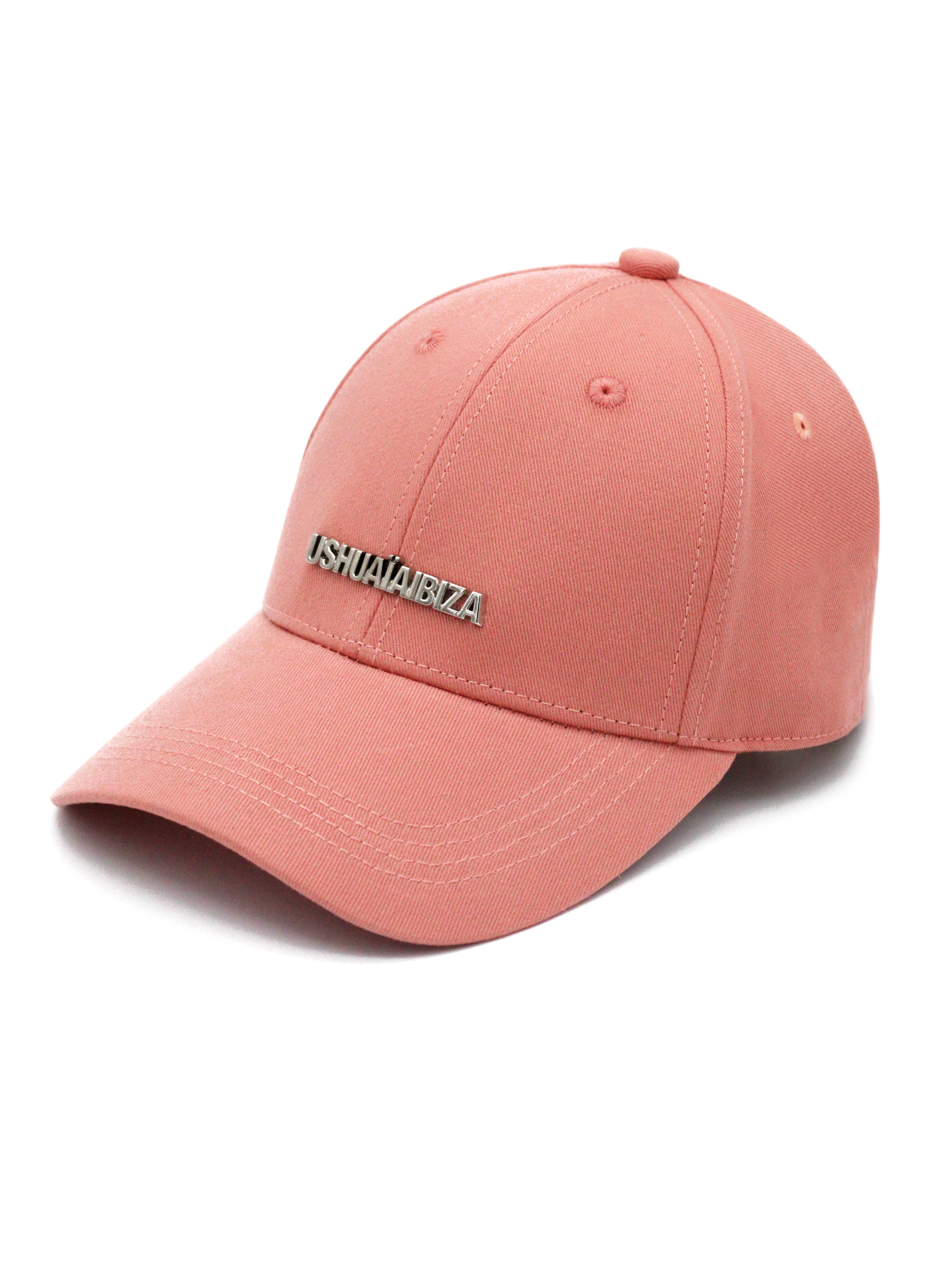 Ushuaïa Pink Plate Cap made of 100% cotton with exclusive metallic logo detail. Adjustable back strap and style inspired by Ibiza.