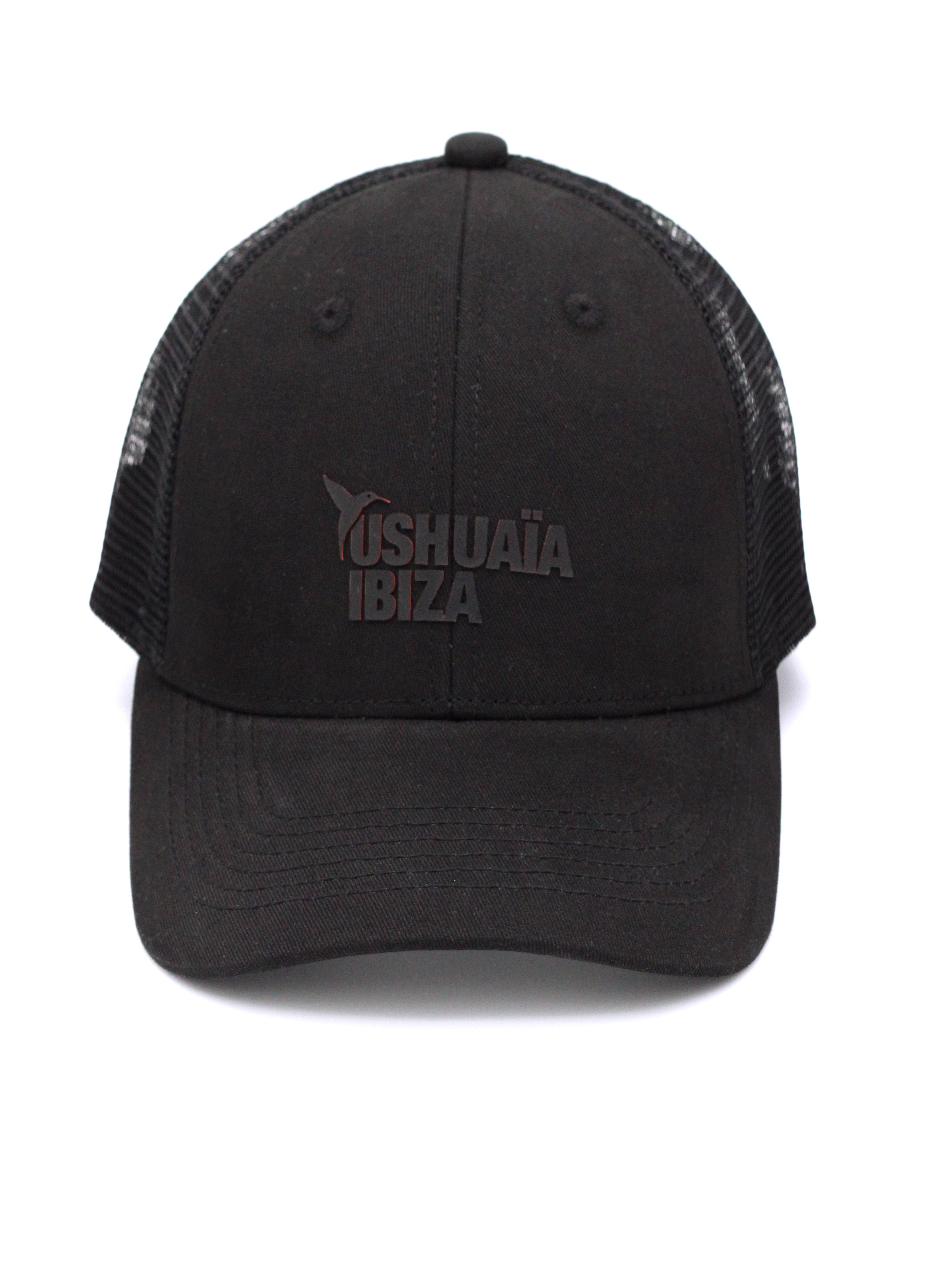 Black Ushuaïa Ibiza trucker cap with tonal rubber logo and mesh back panels