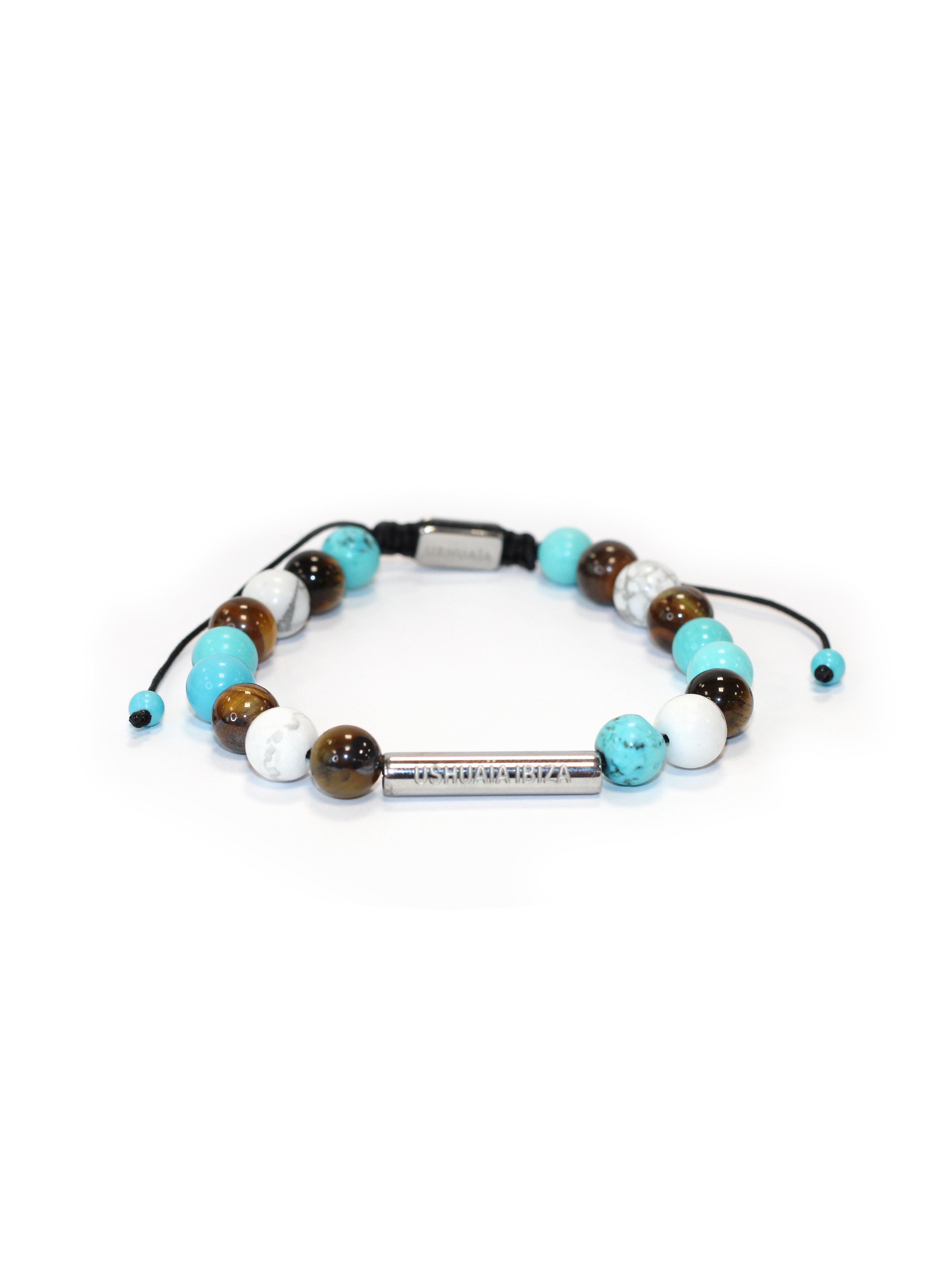 Beaded bracelet with adjustable cord. Includes metal plate engraved with “Ushuaïa Ibiza.” Multicolor design with assorted bead finishes.
COMPOSITION:
synthetic stone beads, metal alloy, polyester cord.