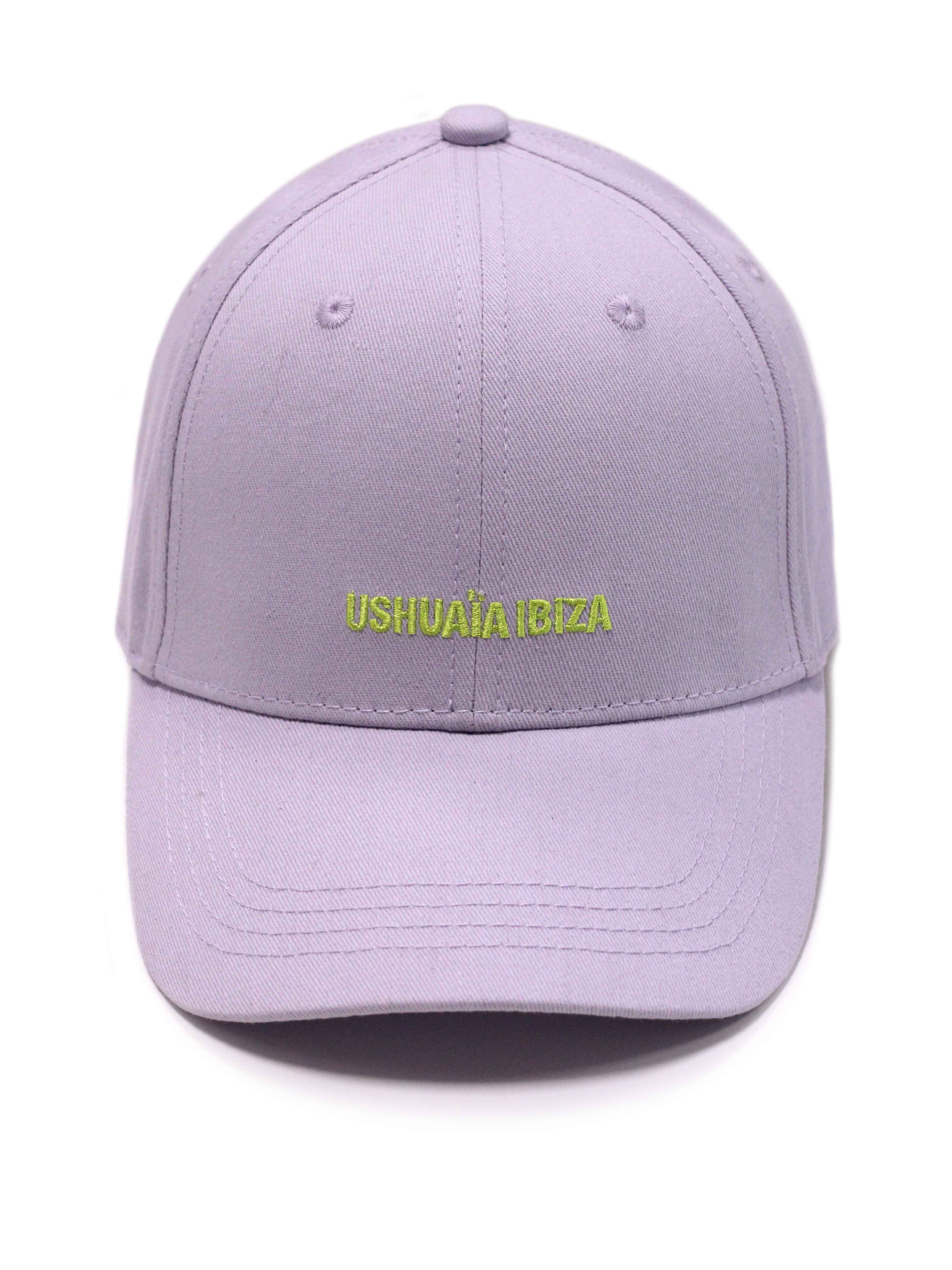 Curved visor cap in lilac with contrasting lime green Ushuaïa Ibiza embroidered logo on the front. Adjustable back strap for a comfortable fit.