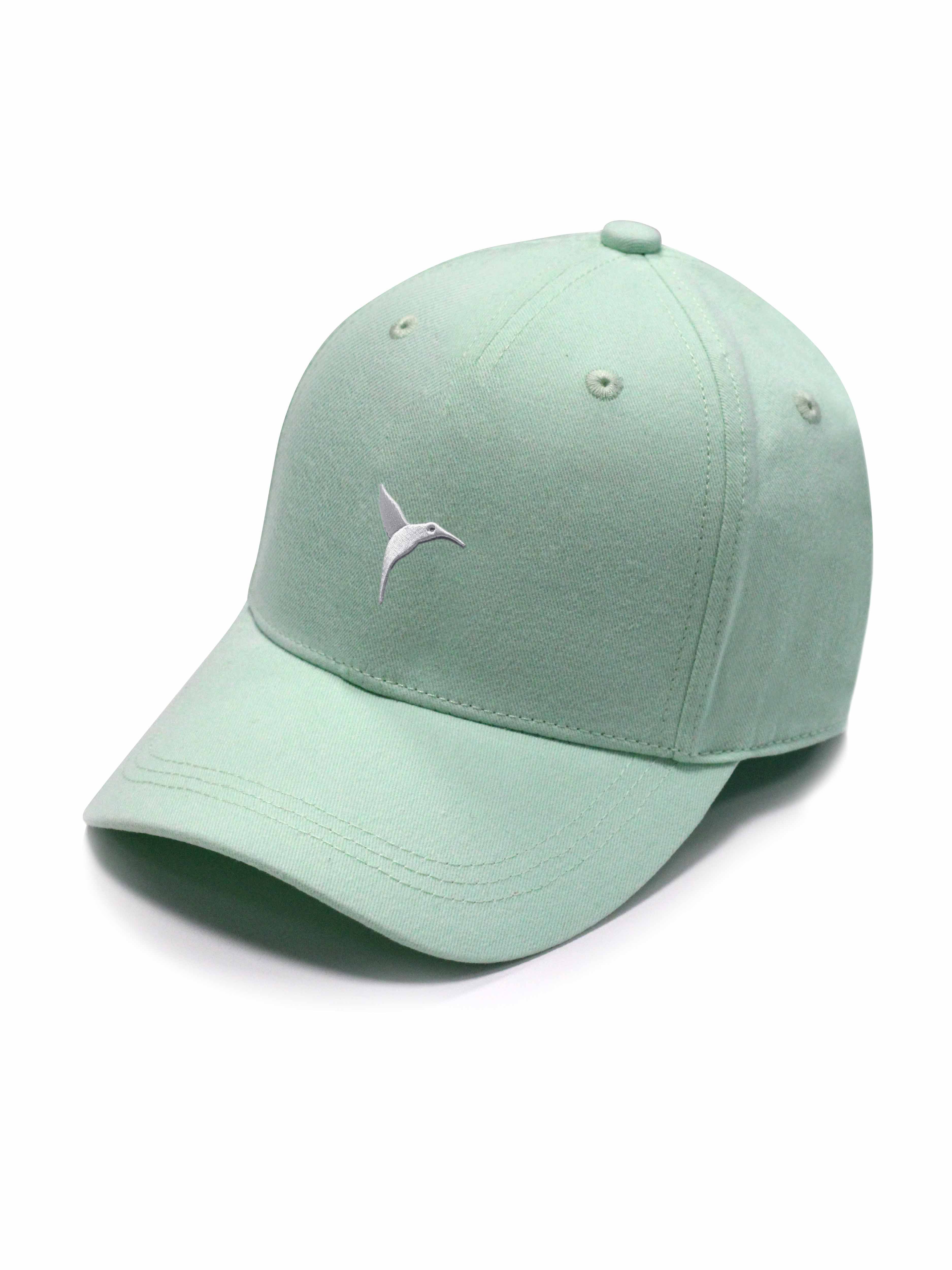 Green curved visor cap with Ushuaïa Ibiza logo embroidered in white on the front. Adjustable back strap for a comfortable fit.