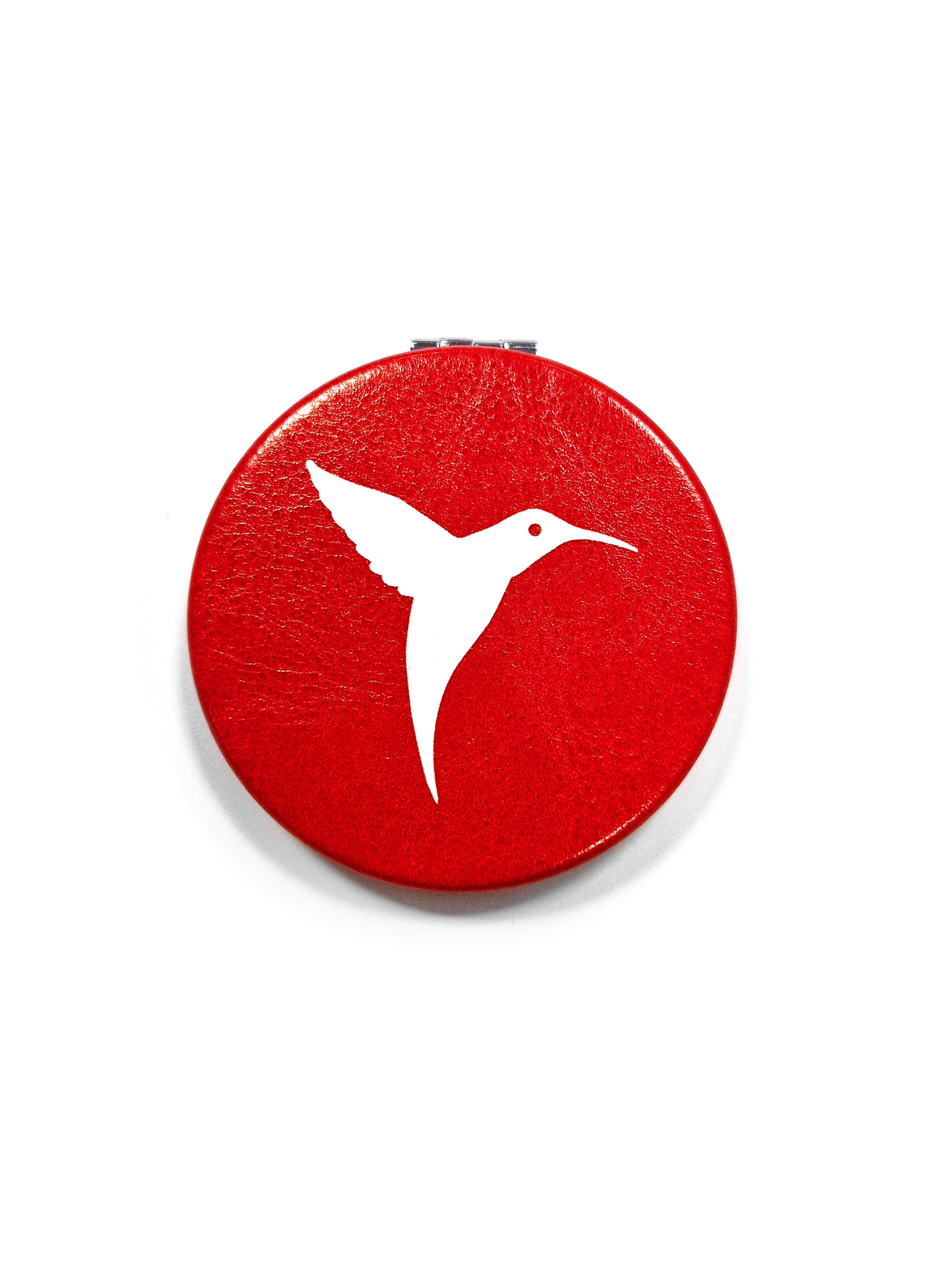 Red Ushuaïa Ibiza compact mirror with hummingbird graphic