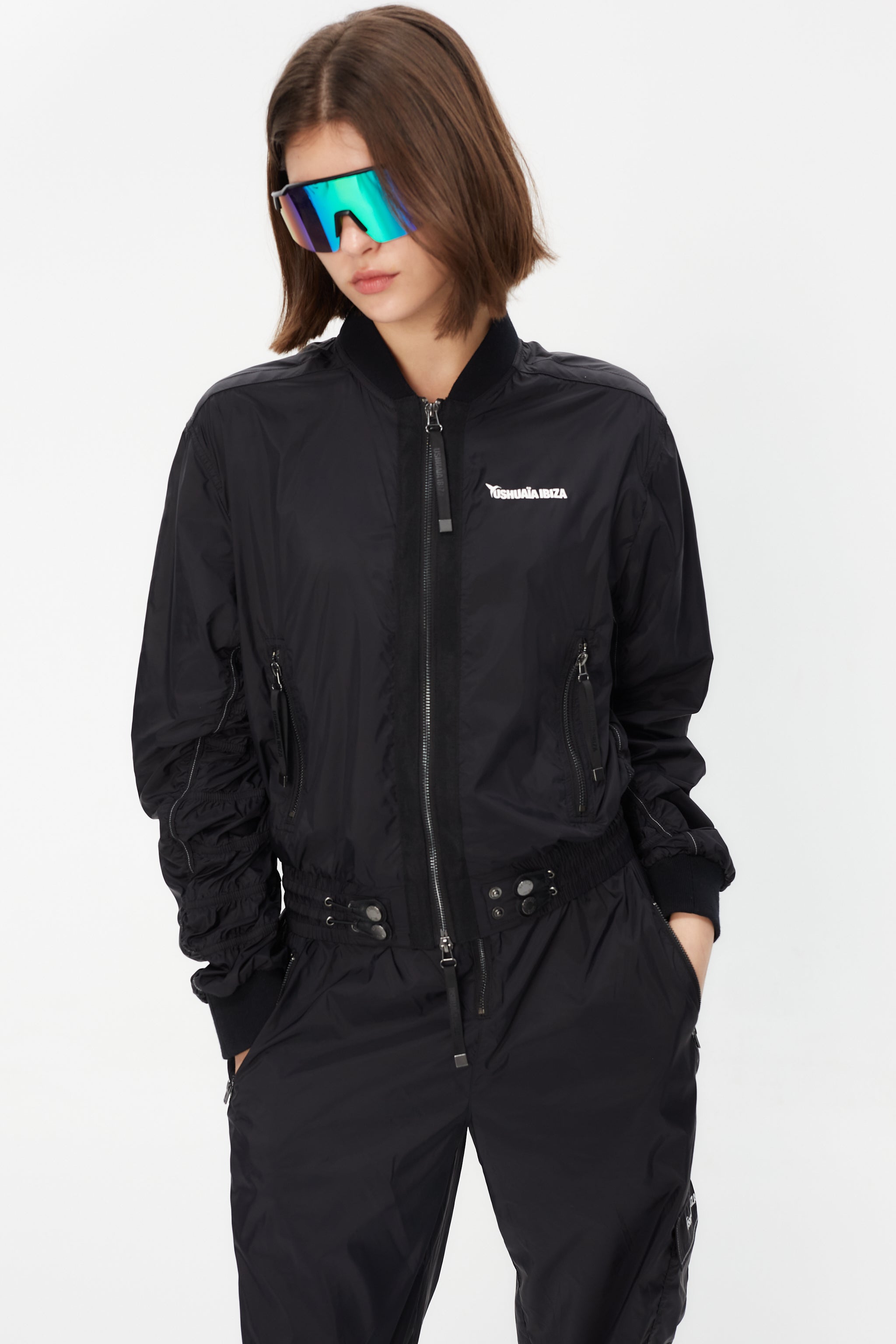 Satin-effect bomber with front details, puffed sleeves, front print, and custom zipper.