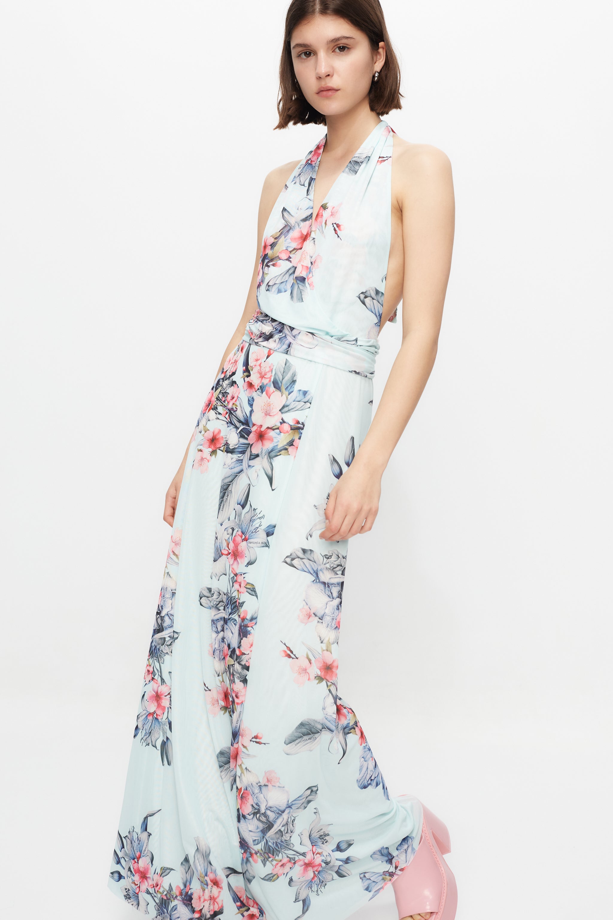 Long multi-position dress with all-over print finish and side slit.