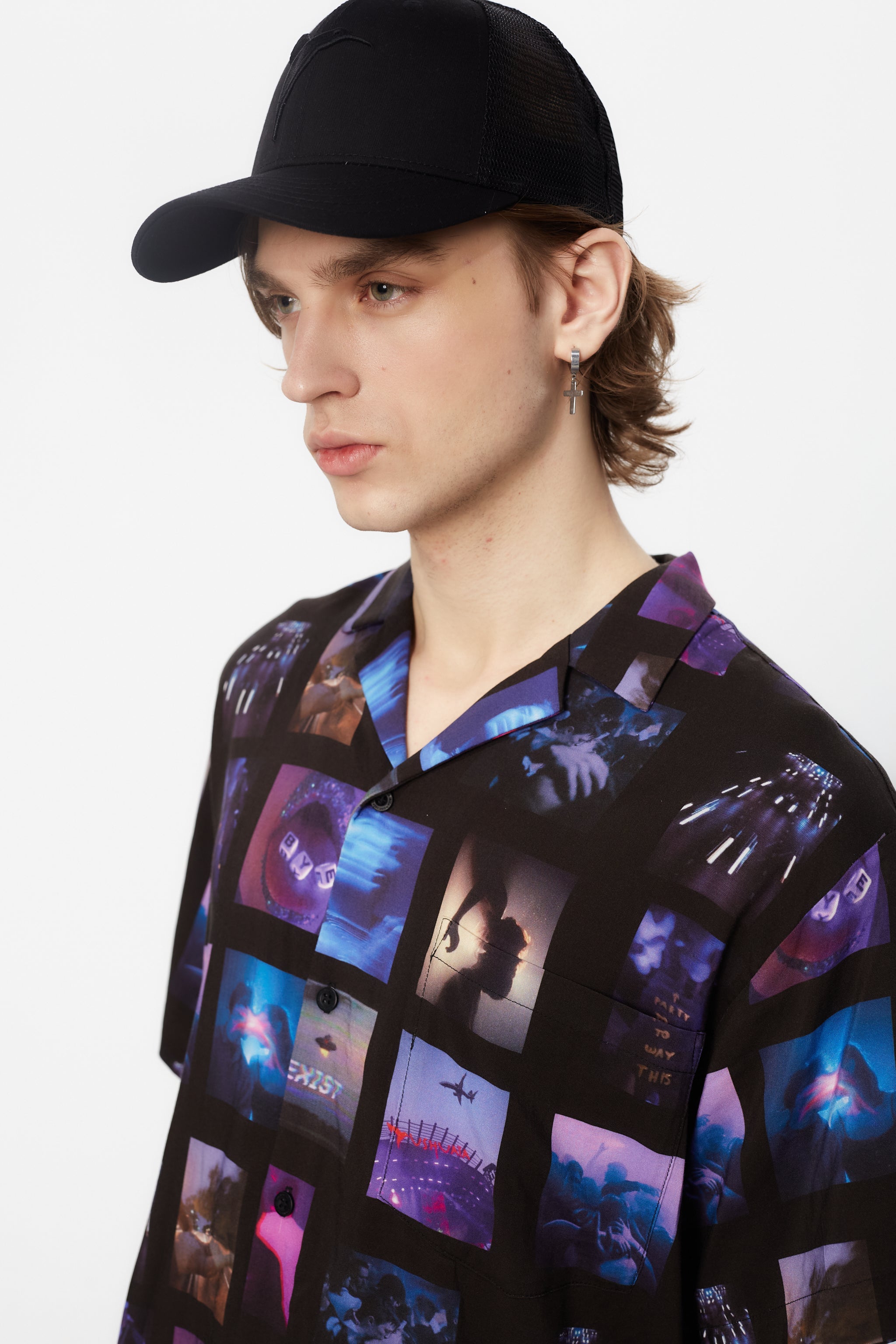 Printed shirt made of blend fabric. Lapel collar and short sleeve. Front button closure. Patch detail on the front and personalized label on the back.