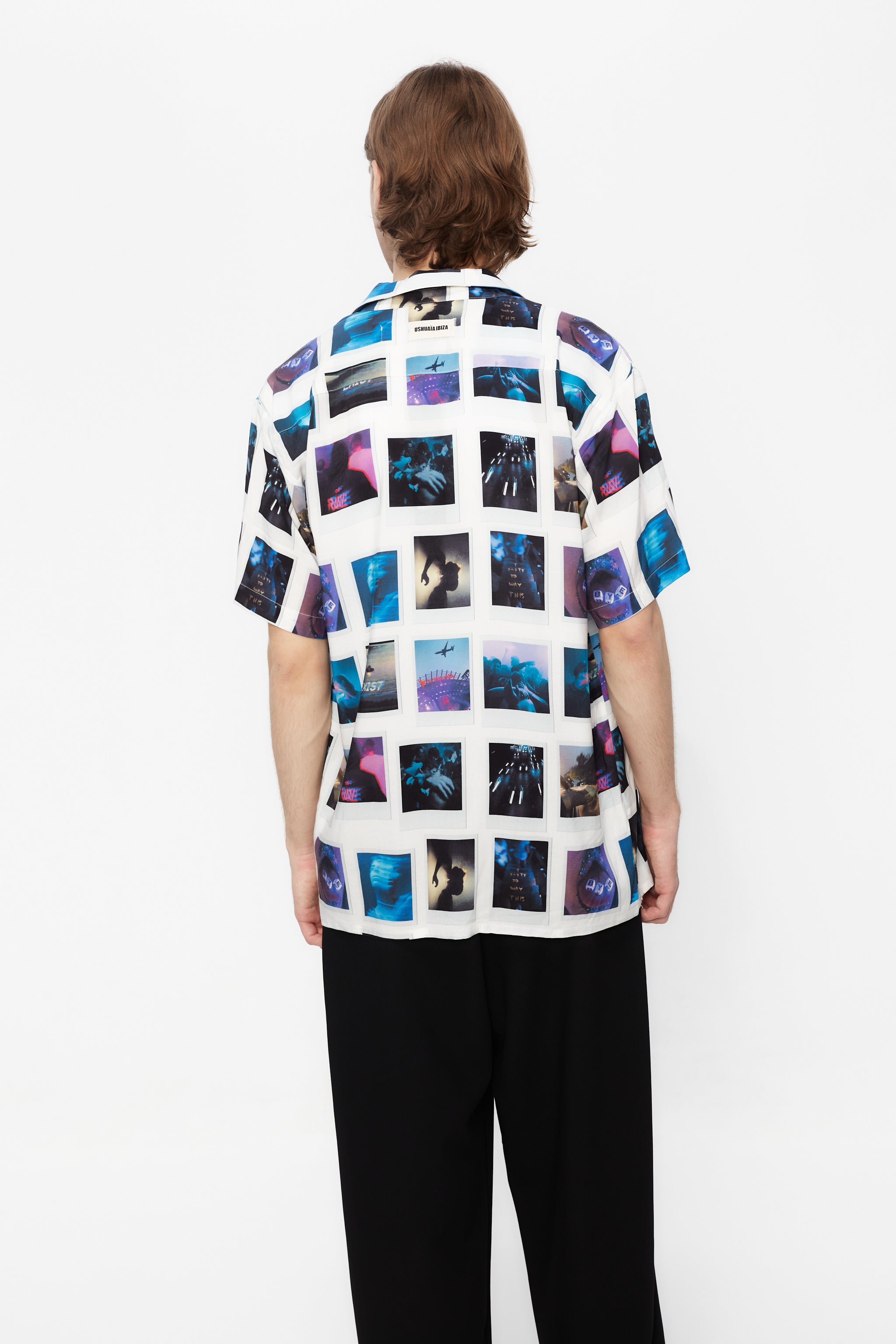 Printed shirt made of blend fabric. Lapel collar and short sleeve. Front button closure. Patch detail on the front and personalized label on the back.