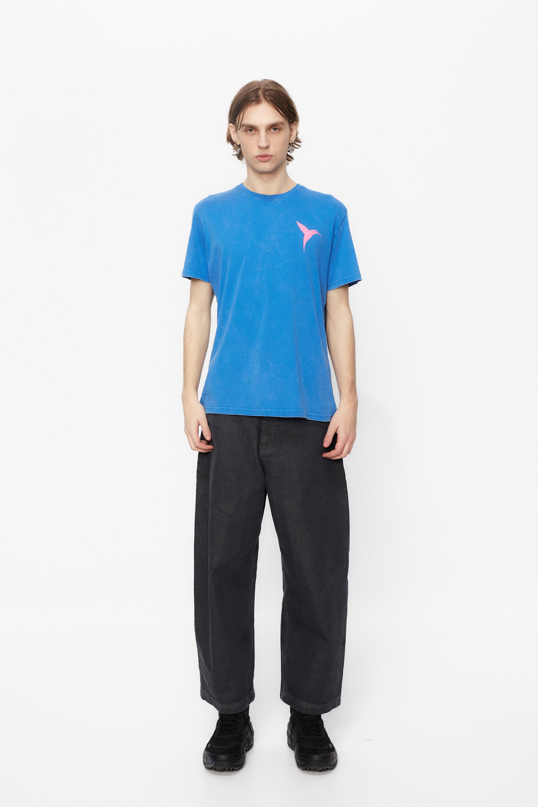 Regular fit t-shirt with round neck and washed short sleeves with fade out effect. Contrast combined print detail on front and back.