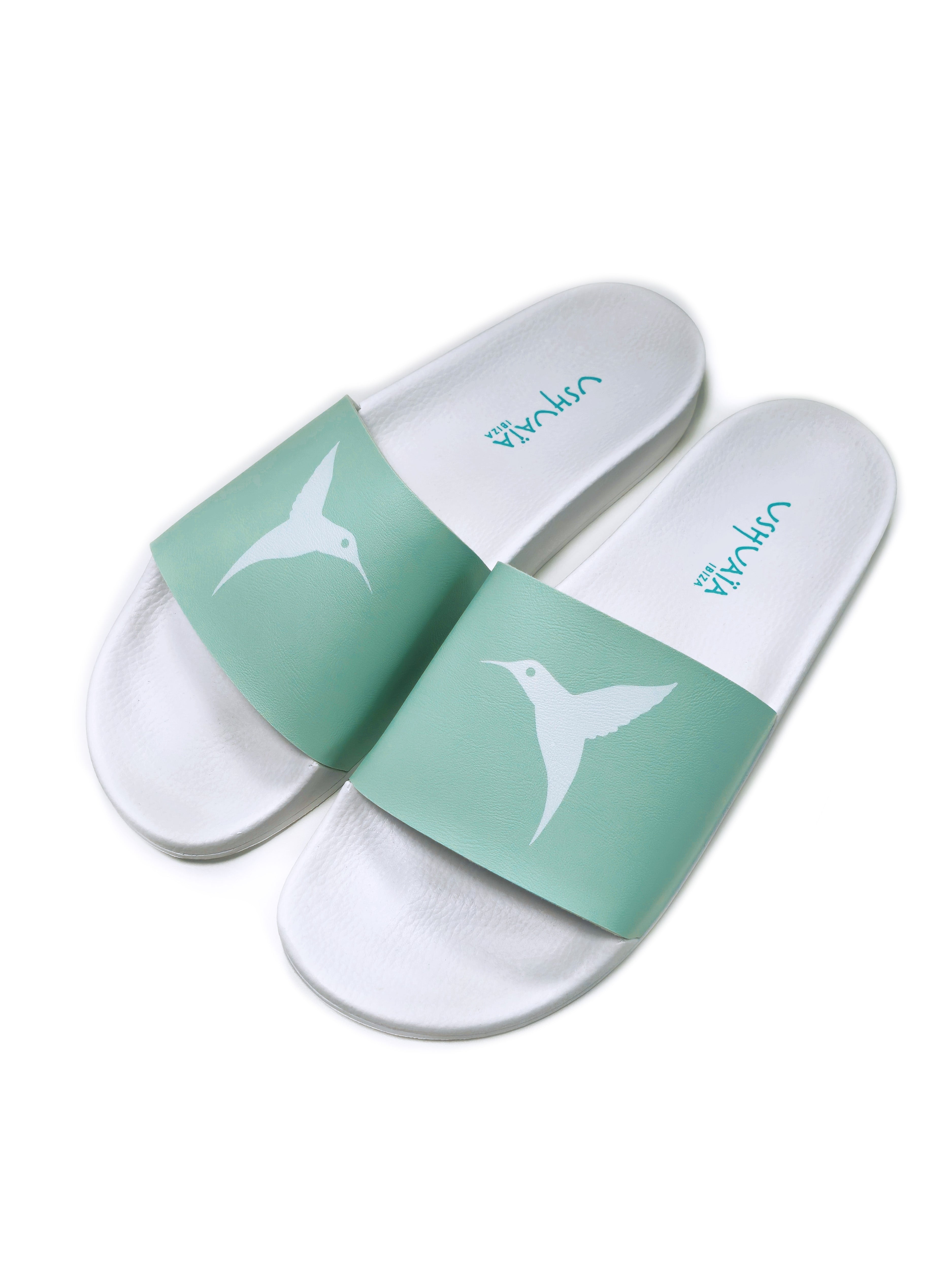 Turquoise flip-flops with white logo