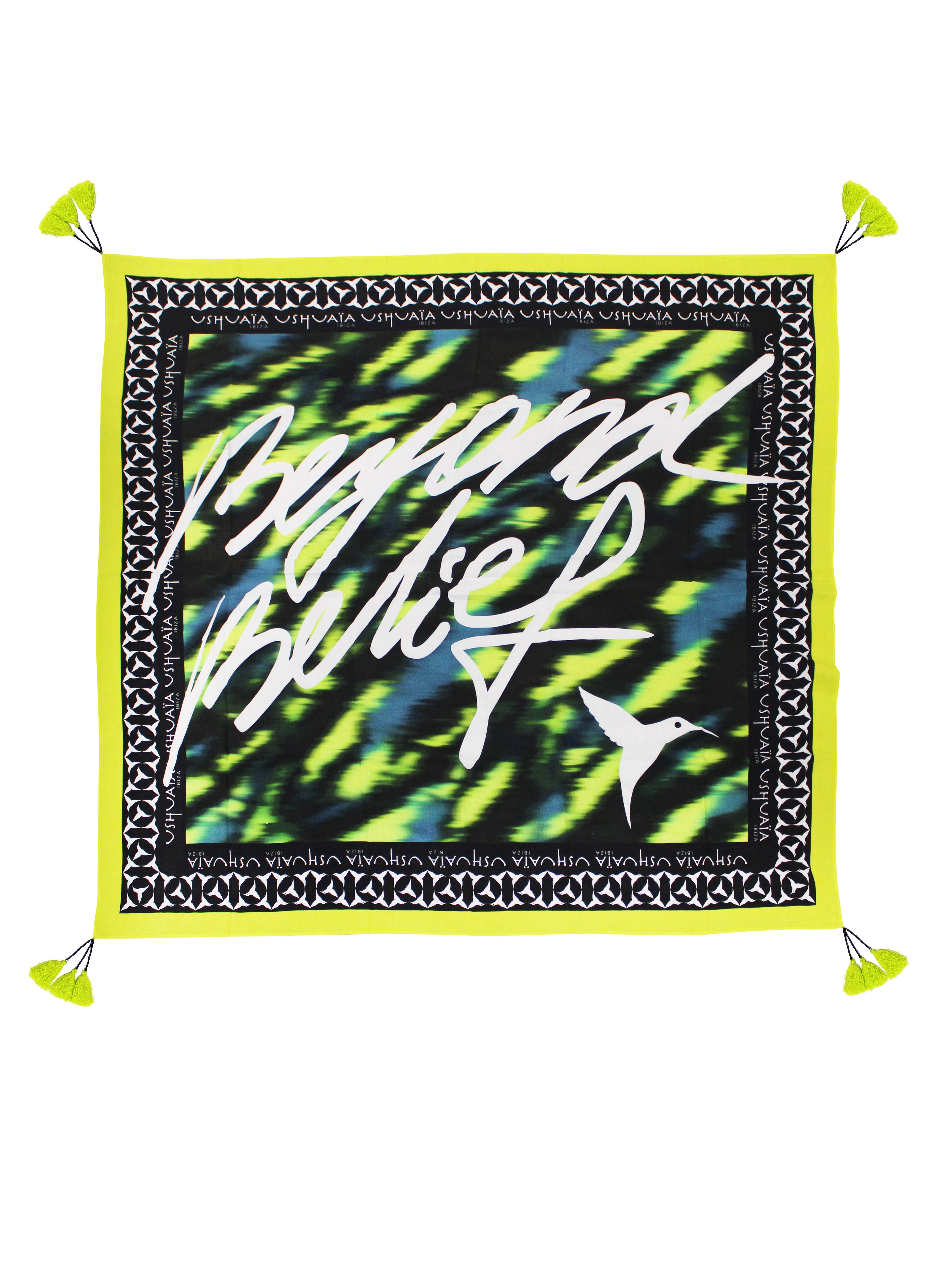 Contrasted sarong with combined print. Decorative tassel detail at the ends.