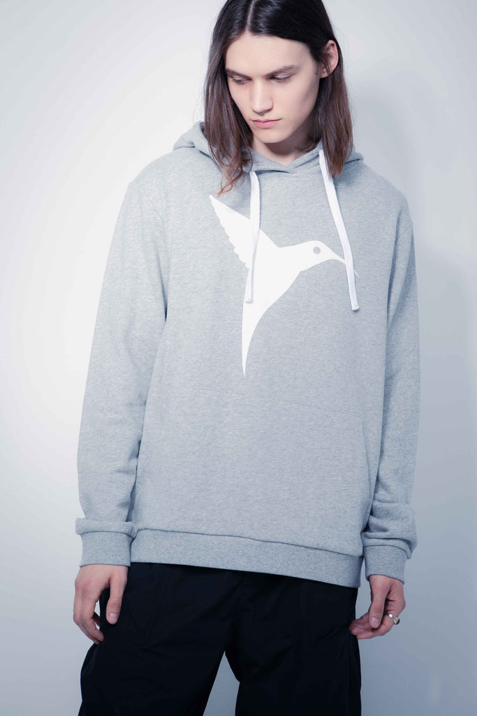 Adjustable hoodie with drawstring and long sleeves. Contrasting combined print detail on the front and back. Kangaroo pocket on the front. Rib finishes. 