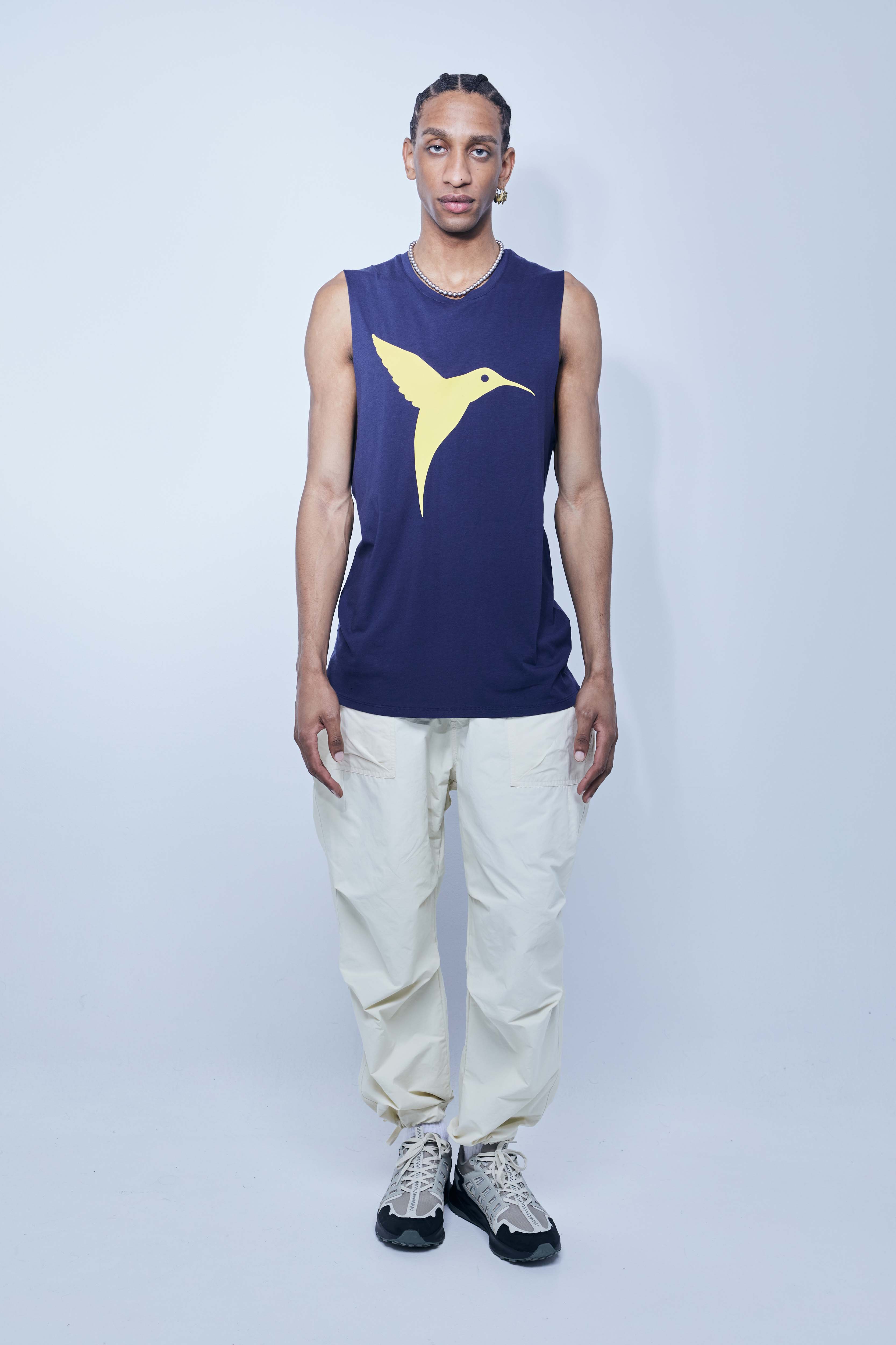 Round neck T-shirt with washed armhole sleeves with a fade out effect. Contrasting combined print detail on the front and back. 