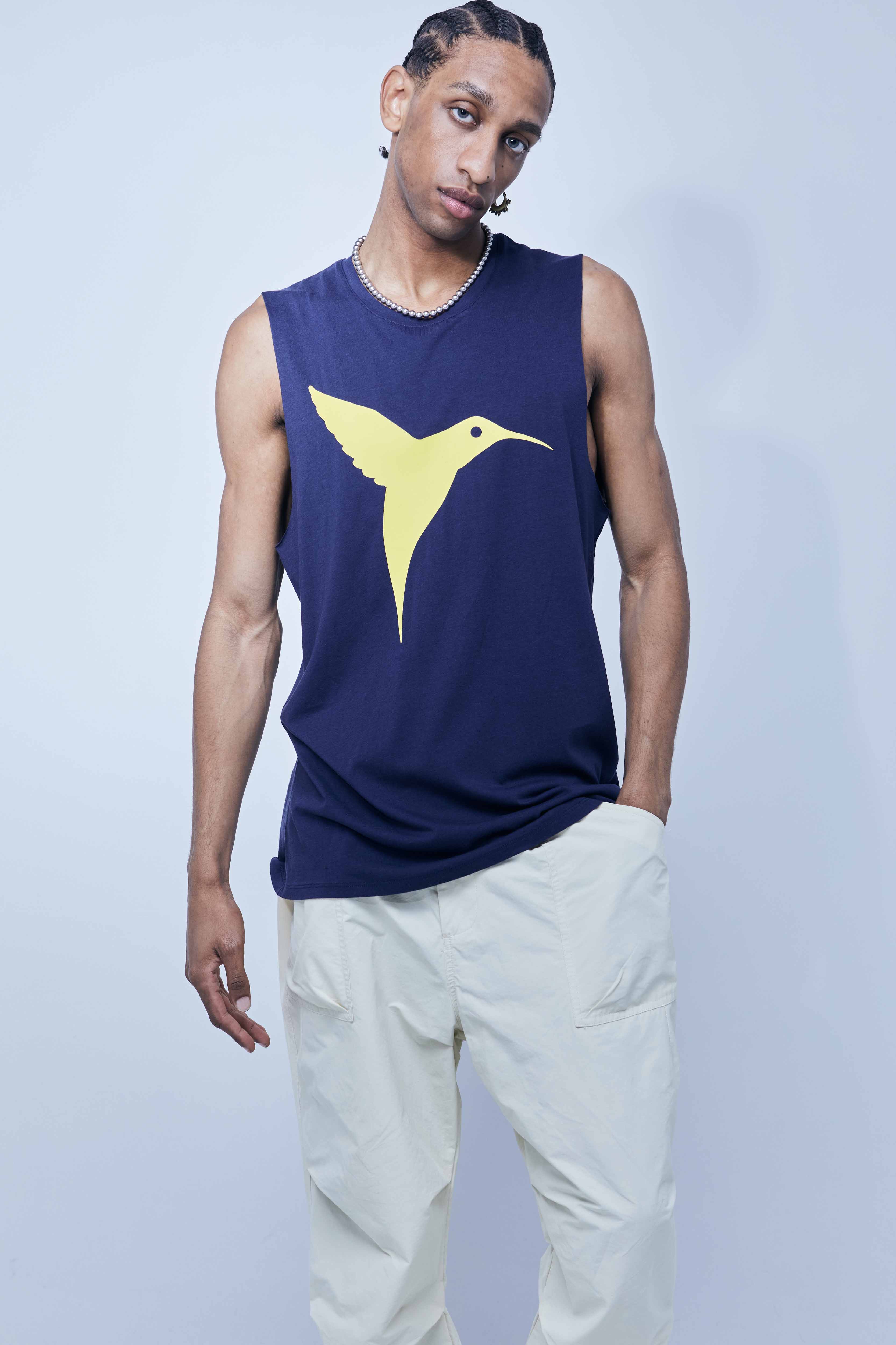 Round neck T-shirt with washed armhole sleeves with a fade out effect. Contrasting combined print detail on the front and back. 