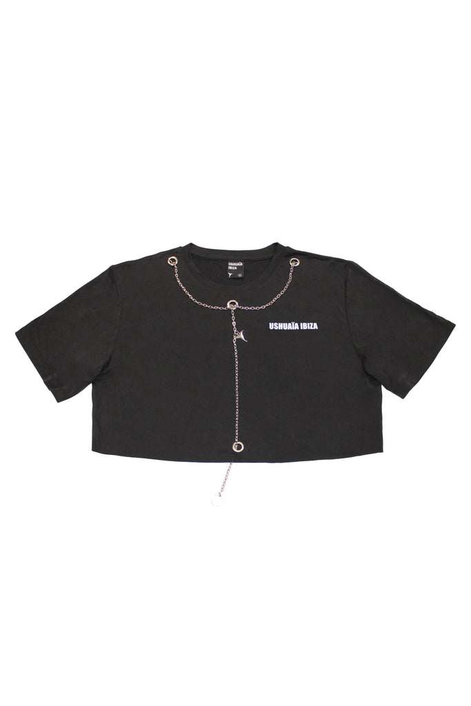 Black cropped T-shirt with metallic finish, bold front print & chain details. Perfect for edgy Ibiza vibes. Shop the trend now!