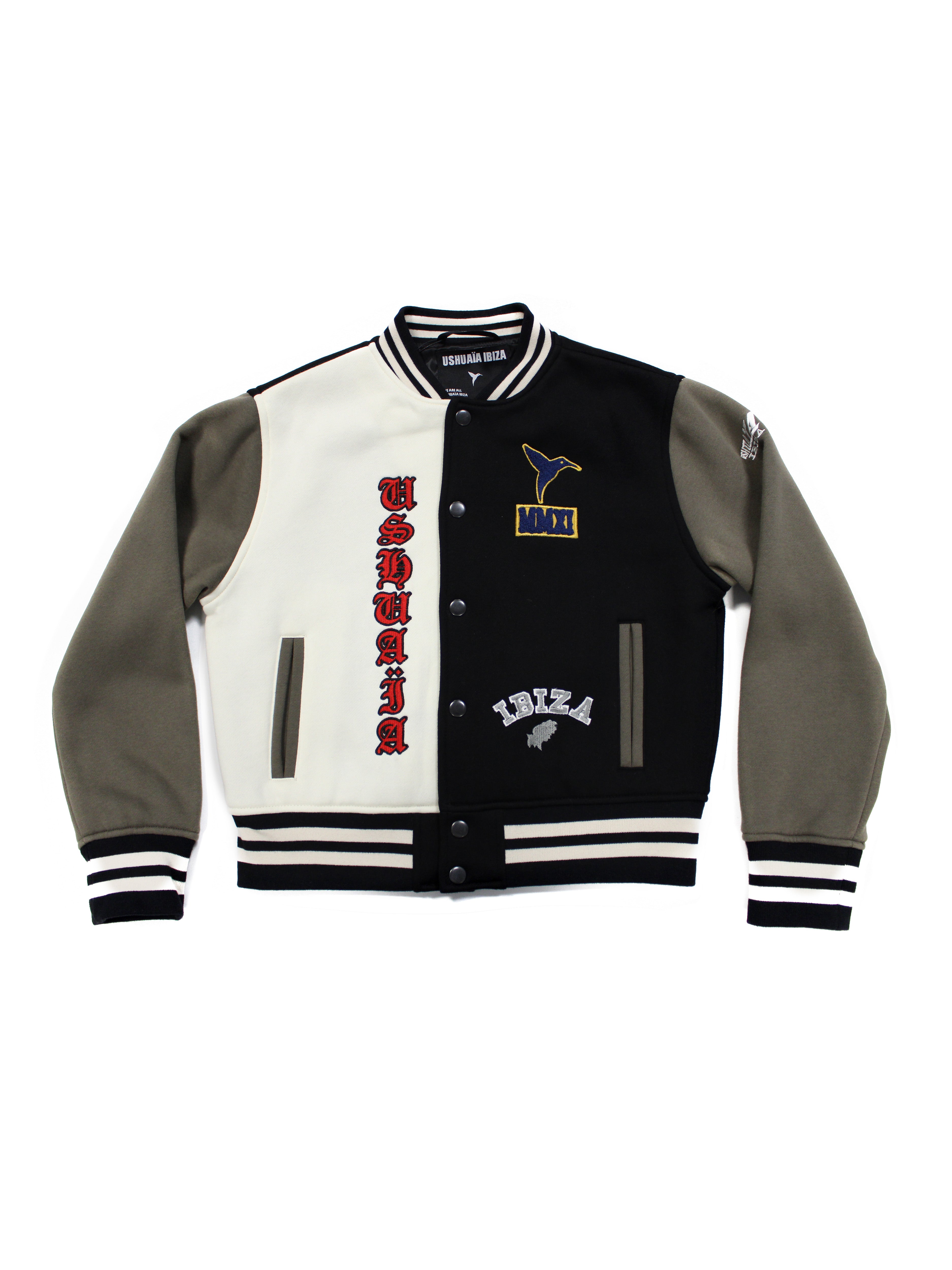 Varsity jacket made of plush fabric. Double welt pockets on the front and interior pocket detail. Application of patches and contrasting combined embroidery on the front and back. Rib finishes. Front closure with snap buttons.