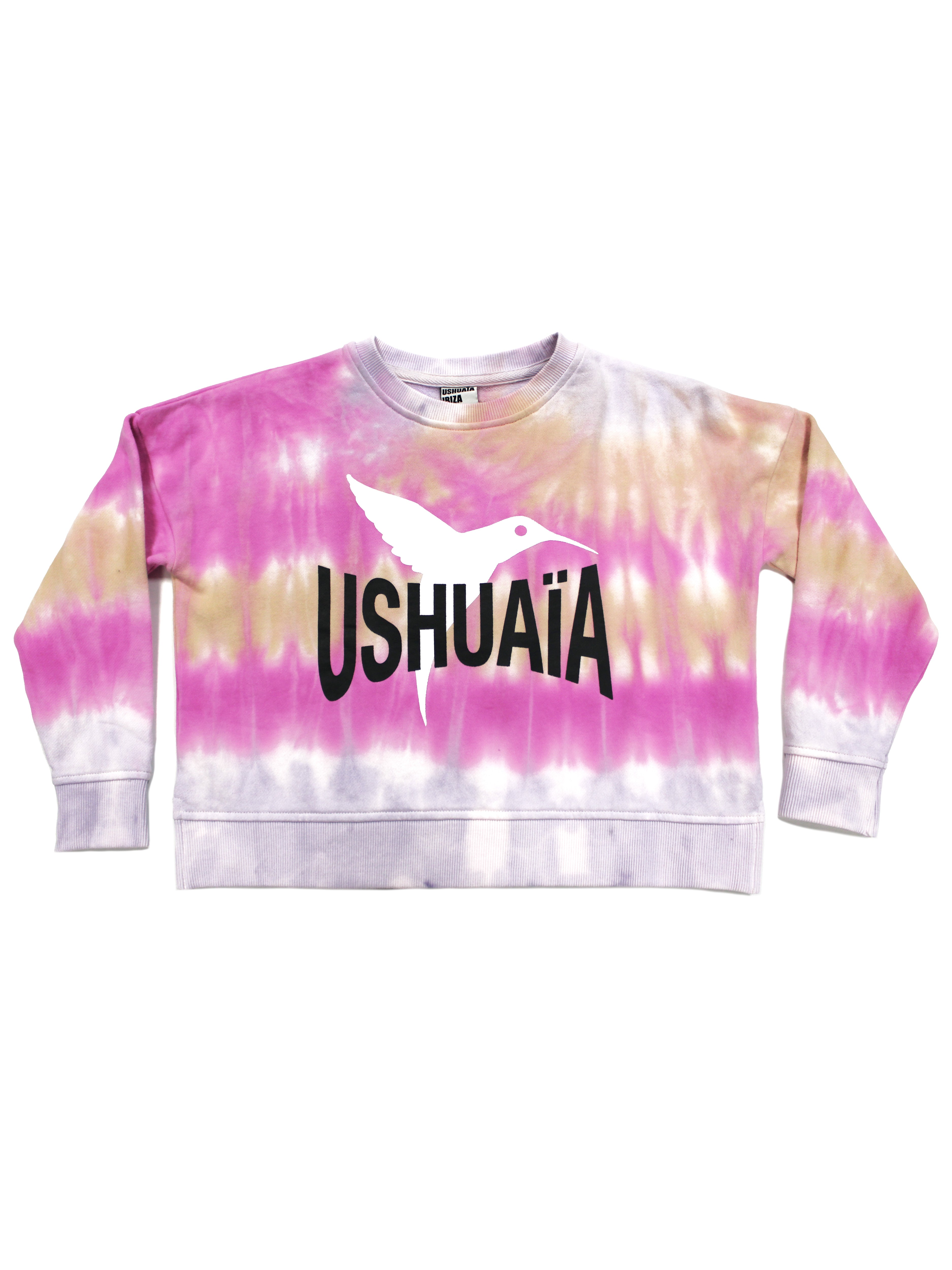 Cropped sweatshirt with a round neck and washed long sleeves with a tie-dye effect. Contrasting combined print detail on the front. Side openings. Rib finishes.