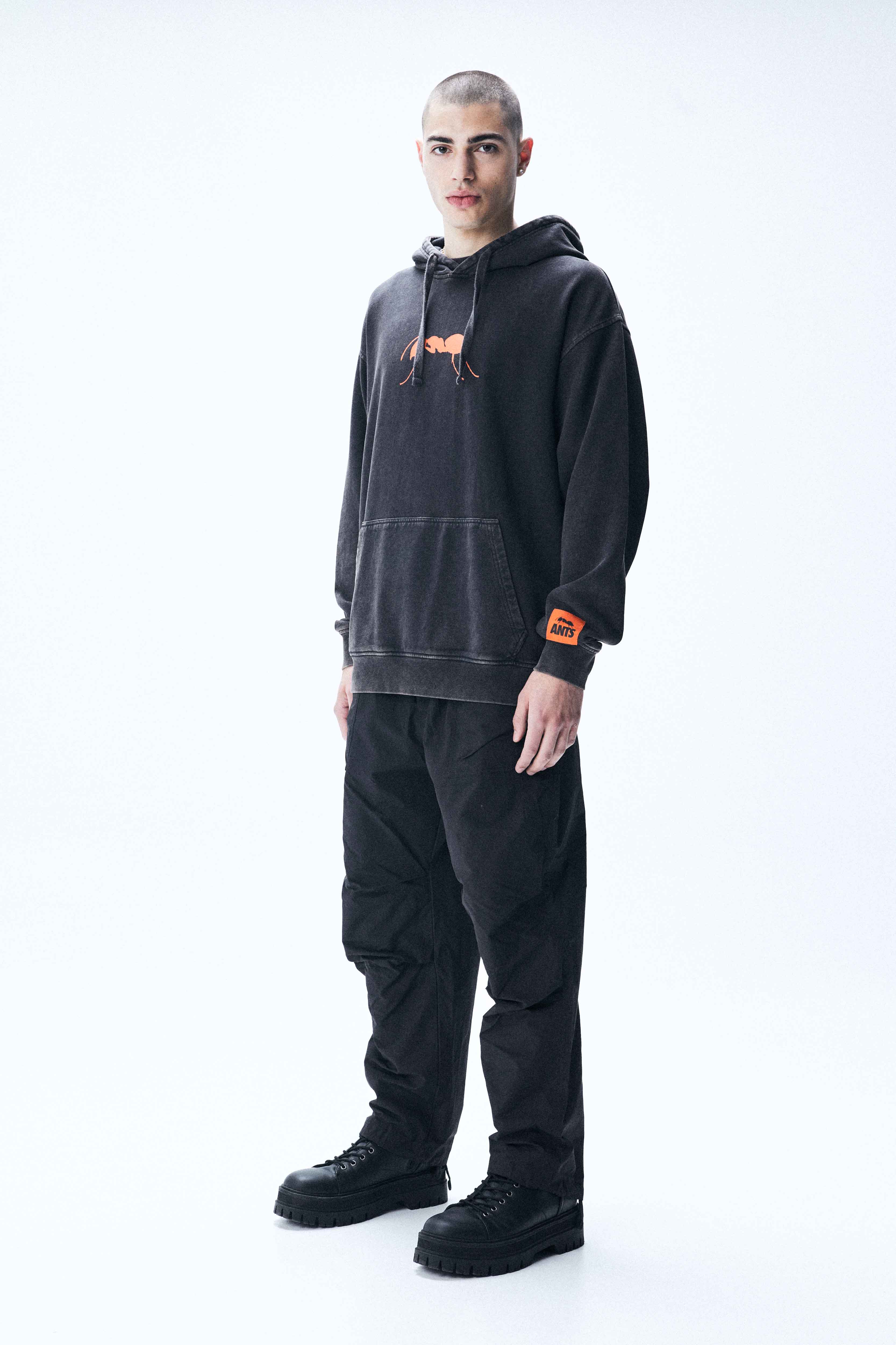 Oversized hoodie with faded-effect sleeves, bold prints, and ribbed trims. 100% cotton comfort for standout Ibiza style.
