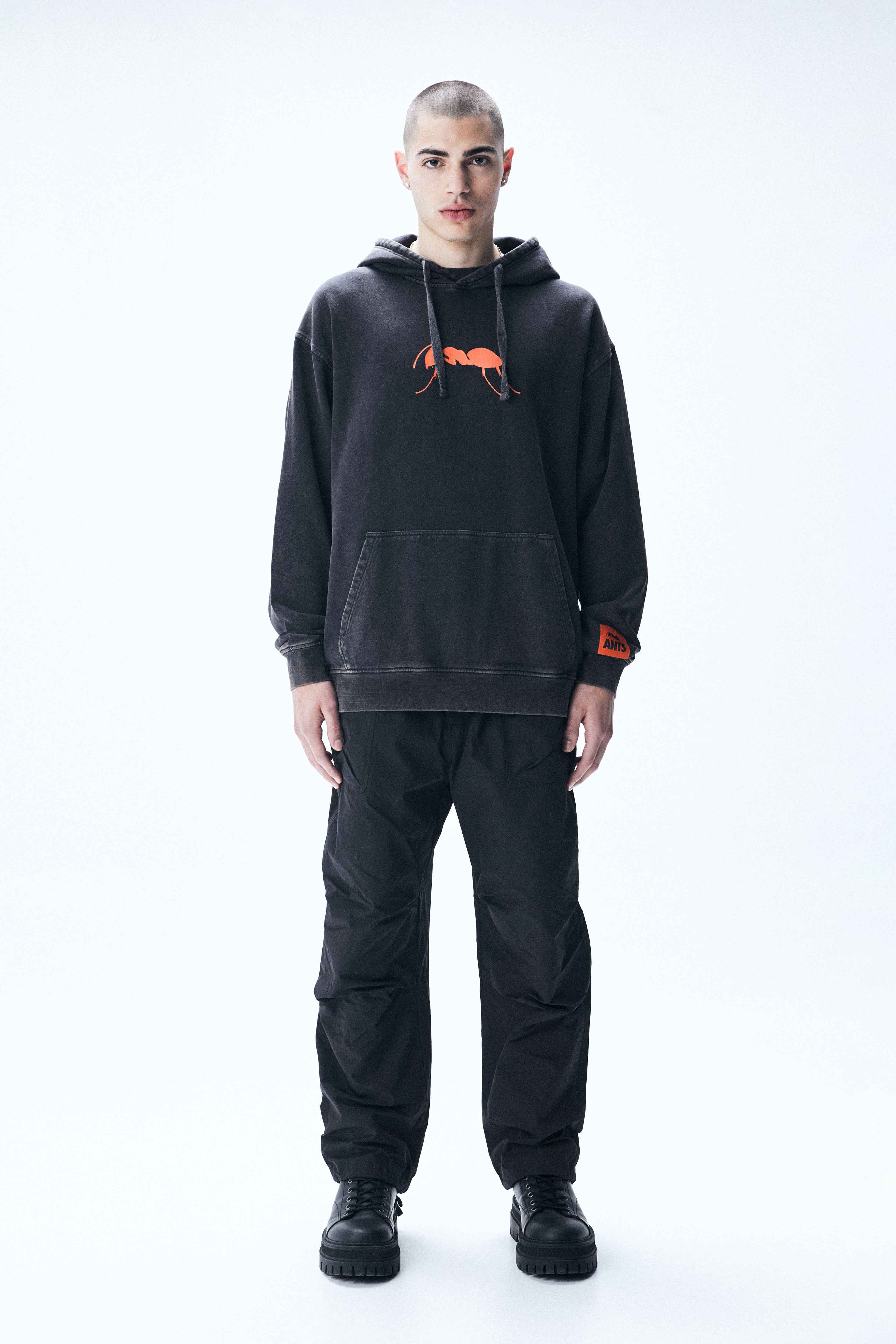 Oversized hoodie with faded-effect sleeves, bold prints, and ribbed trims. 100% cotton comfort for standout Ibiza style.
