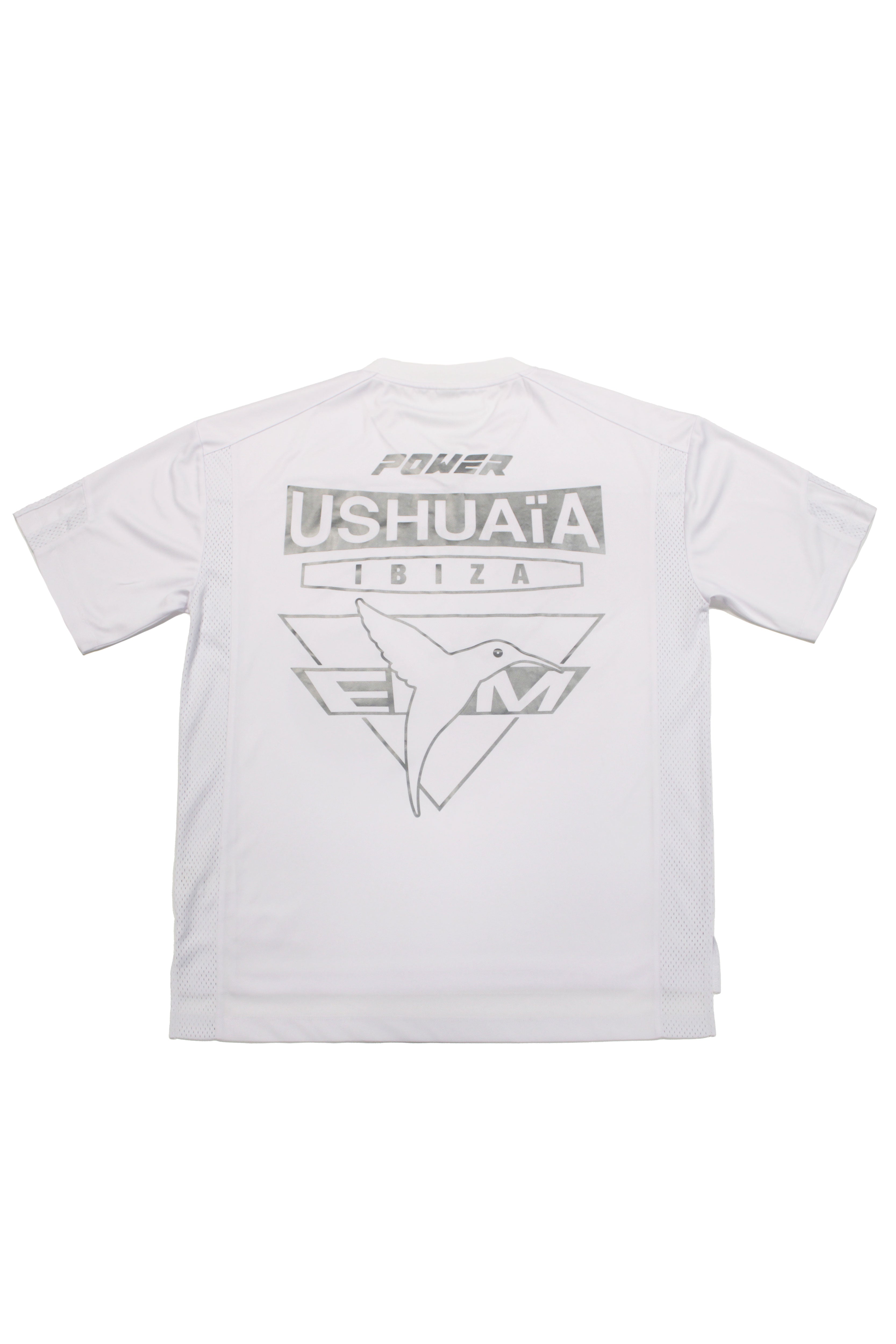 Combined rugby style t-shirt made of technical fabric and mesh, light and breathable. V-neck and short sleeves. Combined reflective print detail on front and back. 