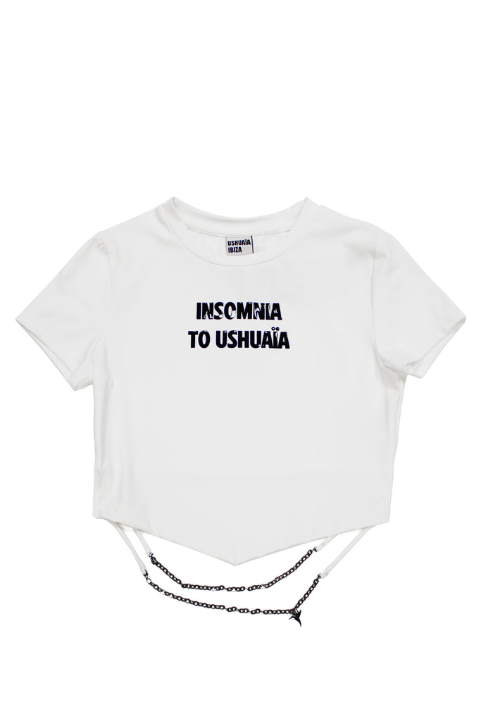 Cropped T-shirt with round neck and short sleeves. Detail of printing detail with gel technique combined with contrast on the front. Front part in peak finish and chain applique on the back