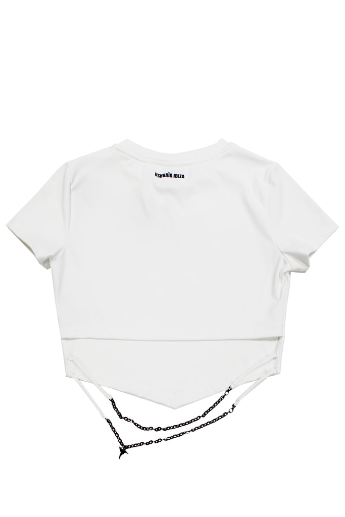 Cropped T-shirt with round neck and short sleeves. Detail of printing detail with gel technique combined with contrast on the front. Front part in peak finish and chain applique on the back