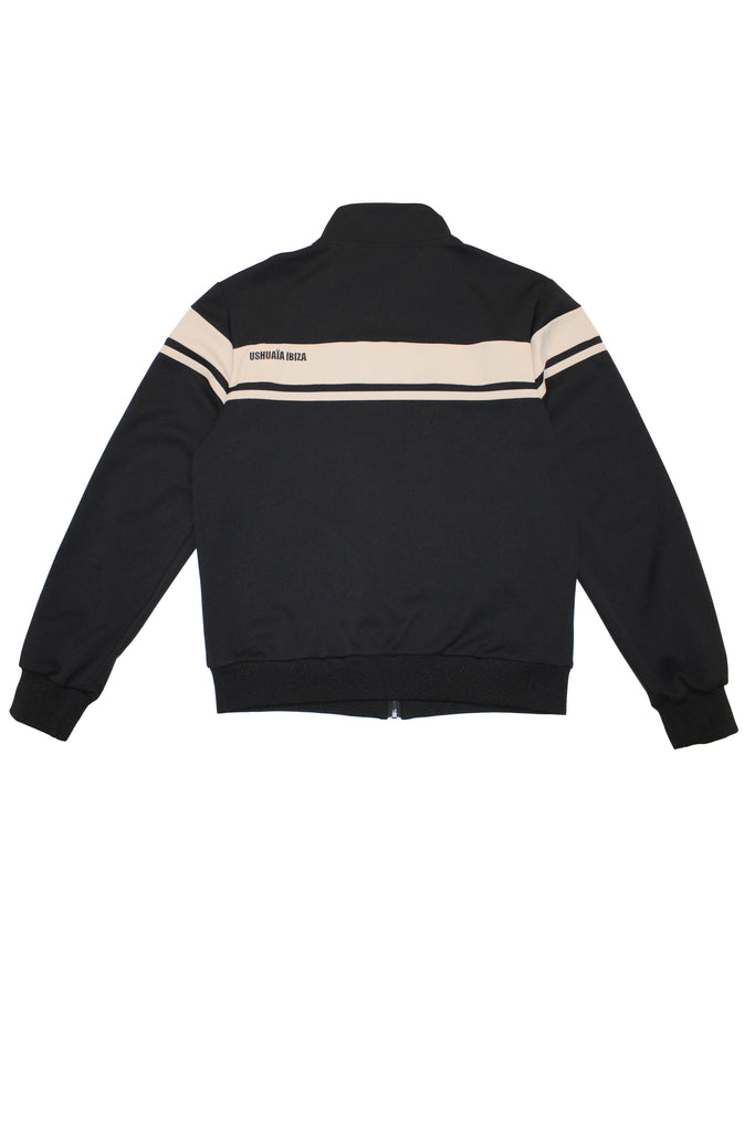 Sports jacket with mandarin collar and central zipper. Contrast combined embroidery detail on the back. Front welt pockets. Ribbed finishes.