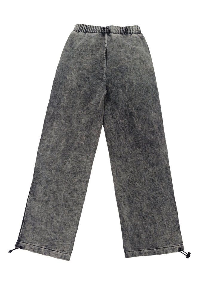 Wide-leg trousers with elastic waistband. Acid wash finish, contrast side print and reflective piping. Full-length design.
 