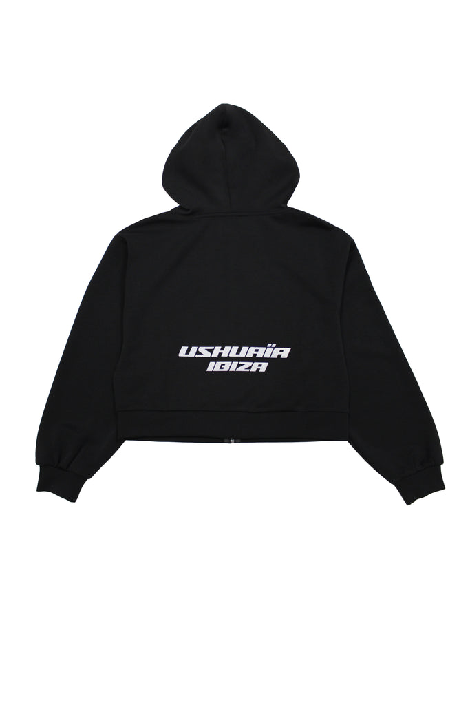 Cropped sweatshirt with hood and front closure. Features a reflective print detail on the back