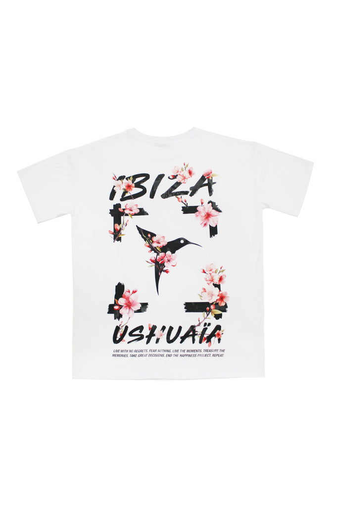 Oversized white T-shirt with bold Ibiza print front & back. Perfect for summer streetwear vibes. Shop the look now!