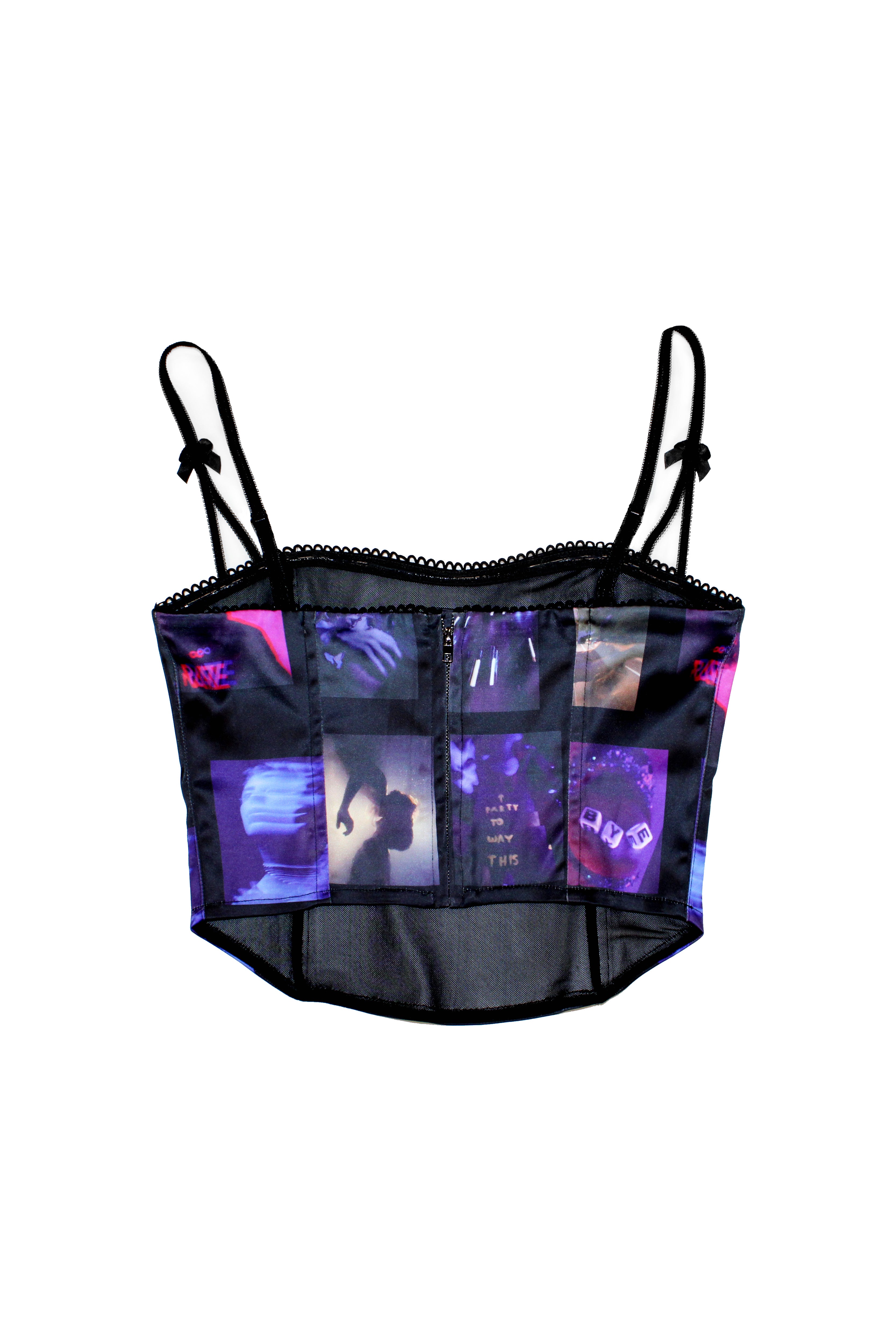 Printed tank top with corset cut and adjustable straps. Central zipper detail on the back. 