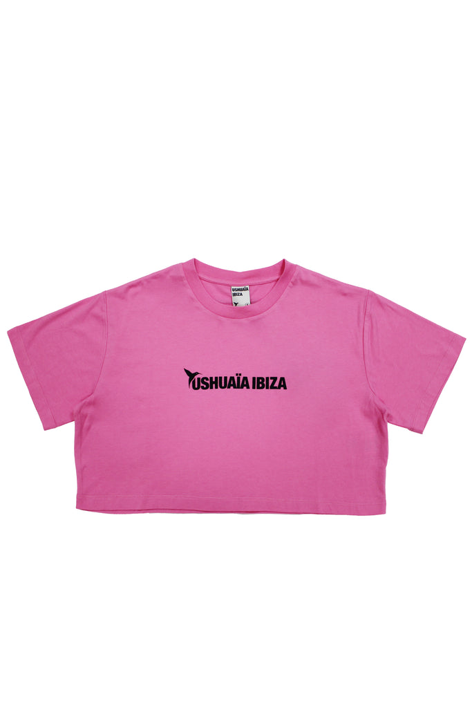 Pink cropped T-shirt with bold Ibiza print & contrast details. Perfect for summer streetwear looks. Shop the vibe now!