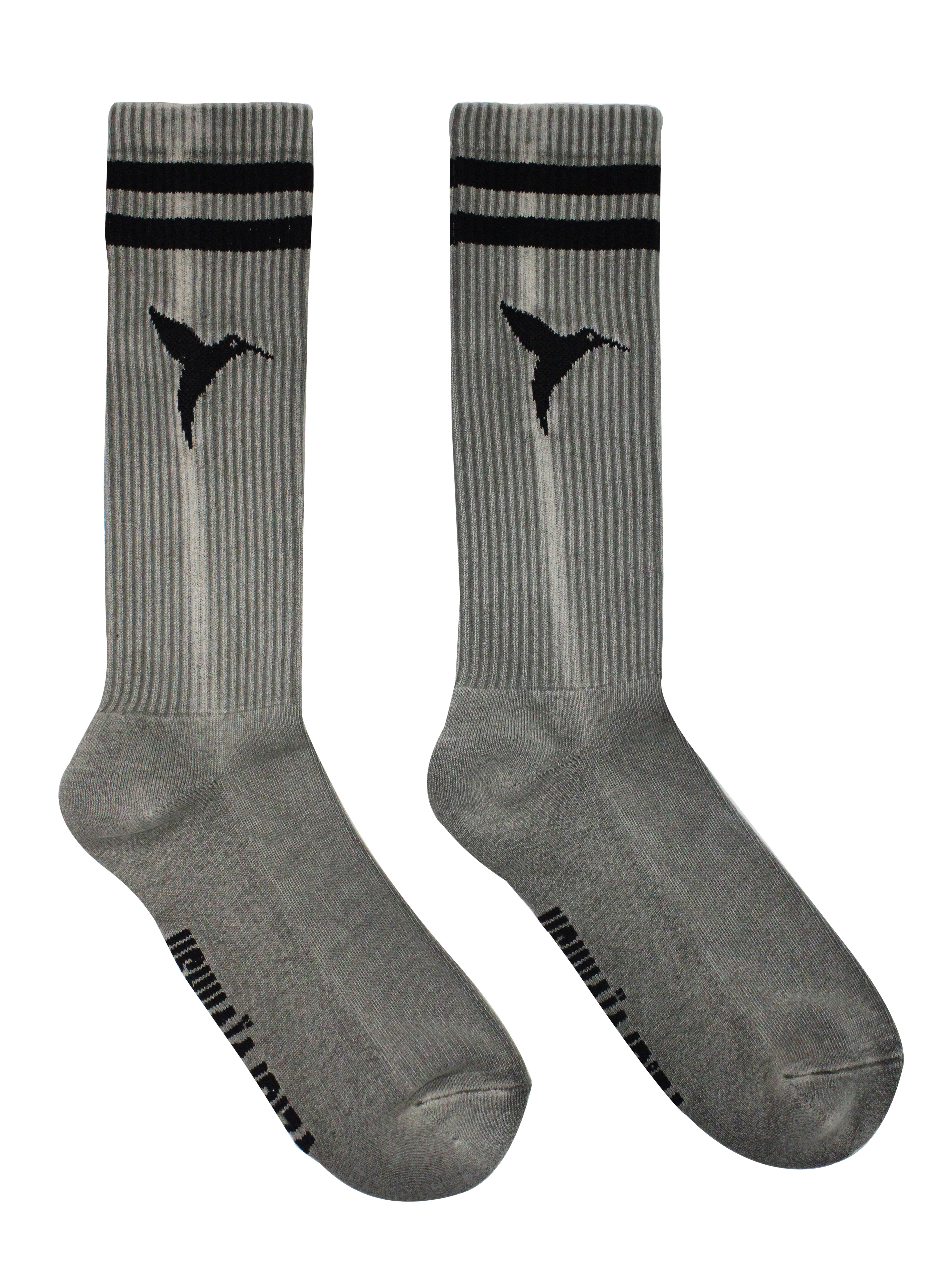 Long socks.
Composition: 80% Polyester, 18% Cotton, 2% Elastane