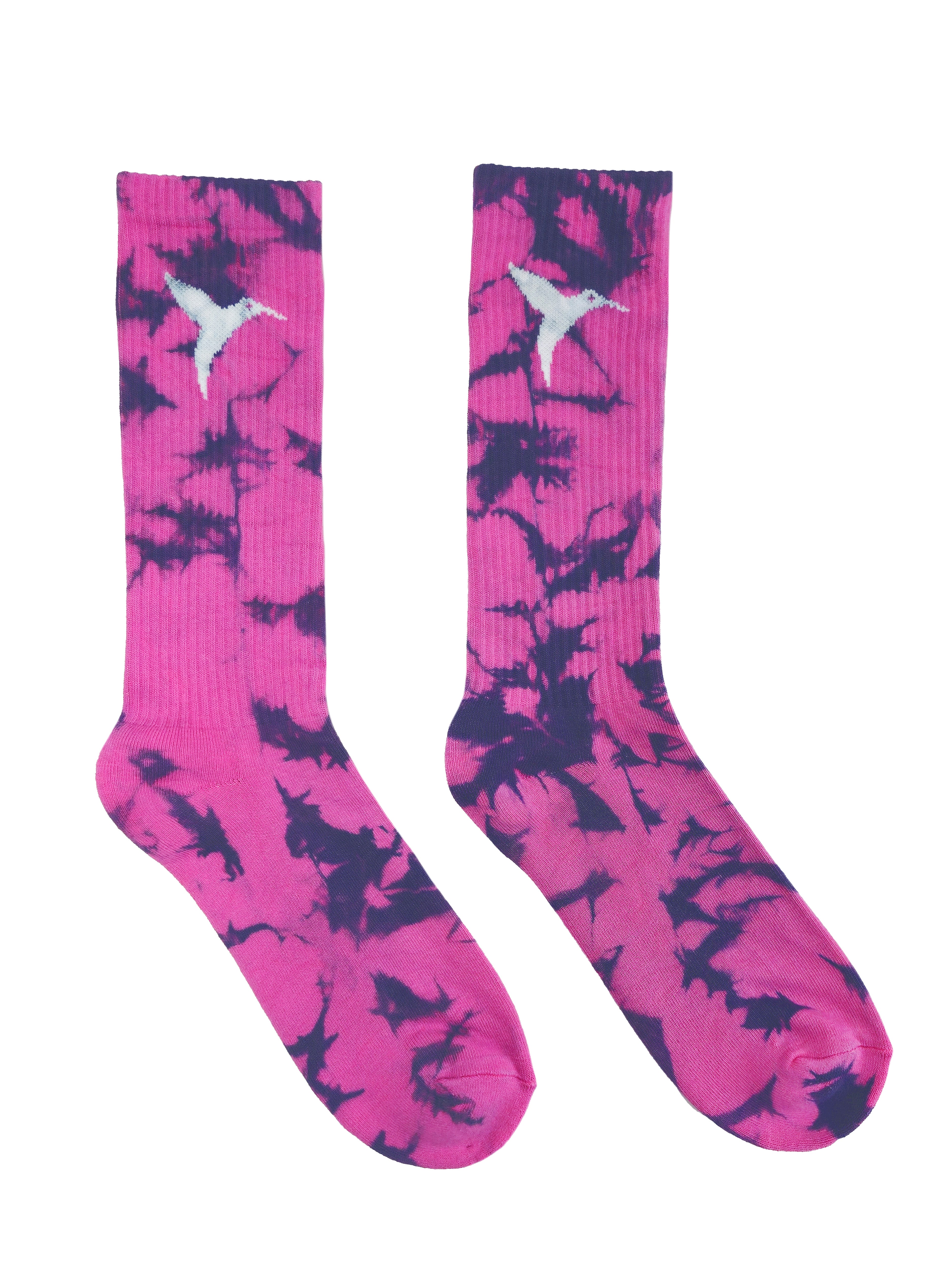 Long pink and black socks with a multicolor tie-dye design. Stretchy and comfortable fabric made from a cotton blend.