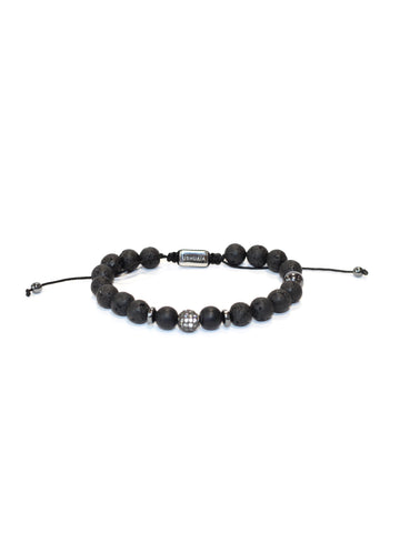 Adjustable bracelet with waxed cord. Black volcanic stone and metal beads. Central detail with inlays and engraved Ushuaïa metal tag. One size, unisex design.
COMPOSITION:  
volcanic stone, metal alloy, textile cord.
