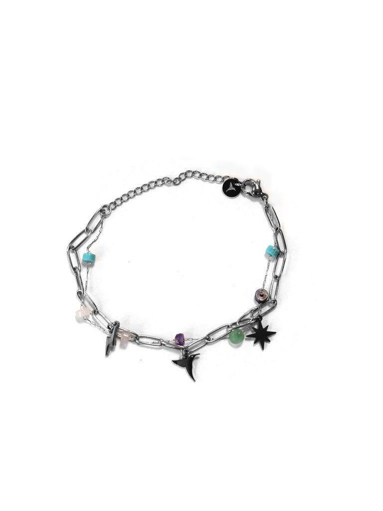 Metal chain bracelet with adjustable lobster clasp. Includes metal charms and multicolor beads. Available in silver and gold finish.
COMPOSITION:
metal alloy, acrylic beads.