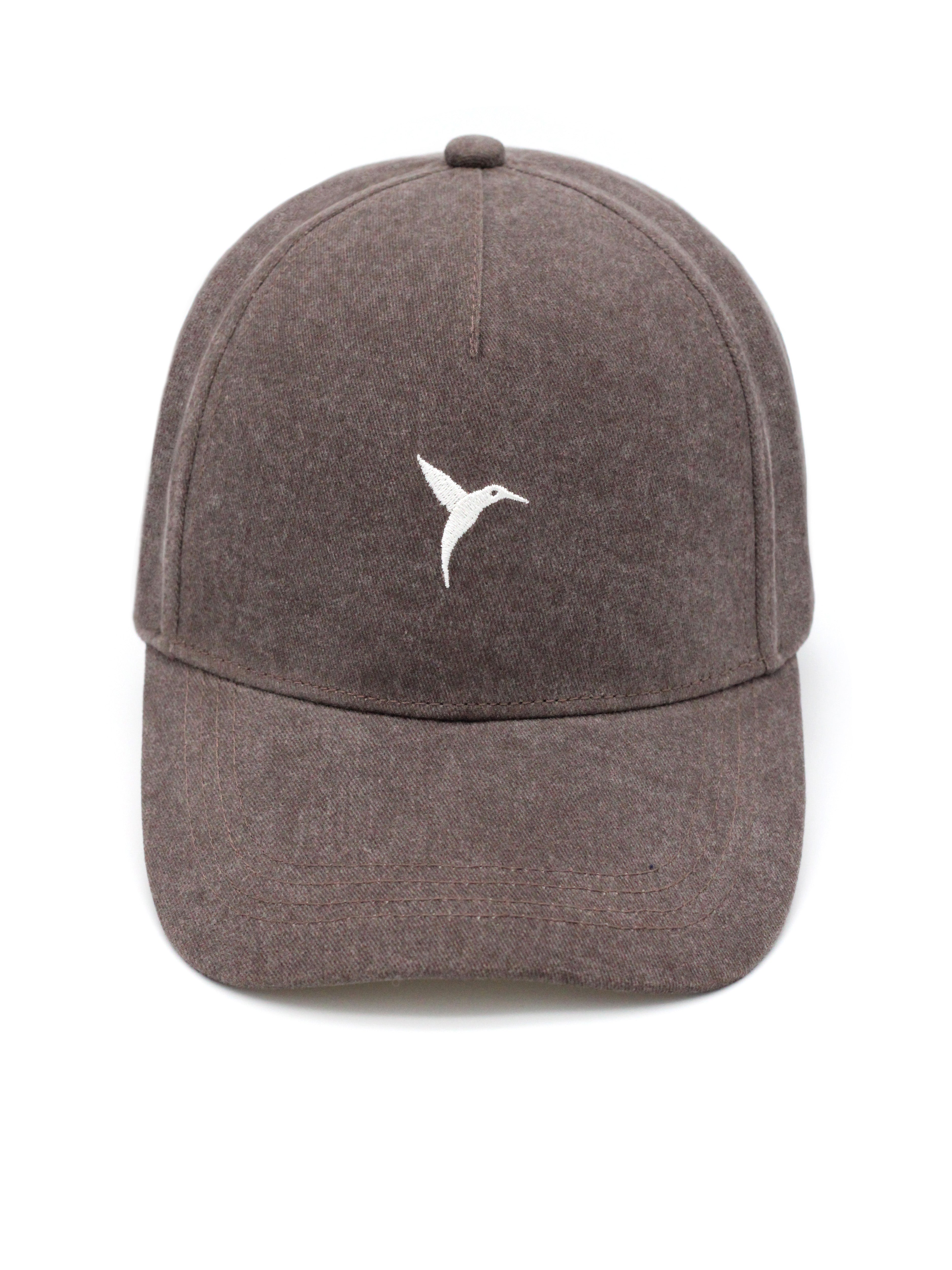 Brown Ushuaïa Ibiza cap with washed finish and contrasting hummingbird logo