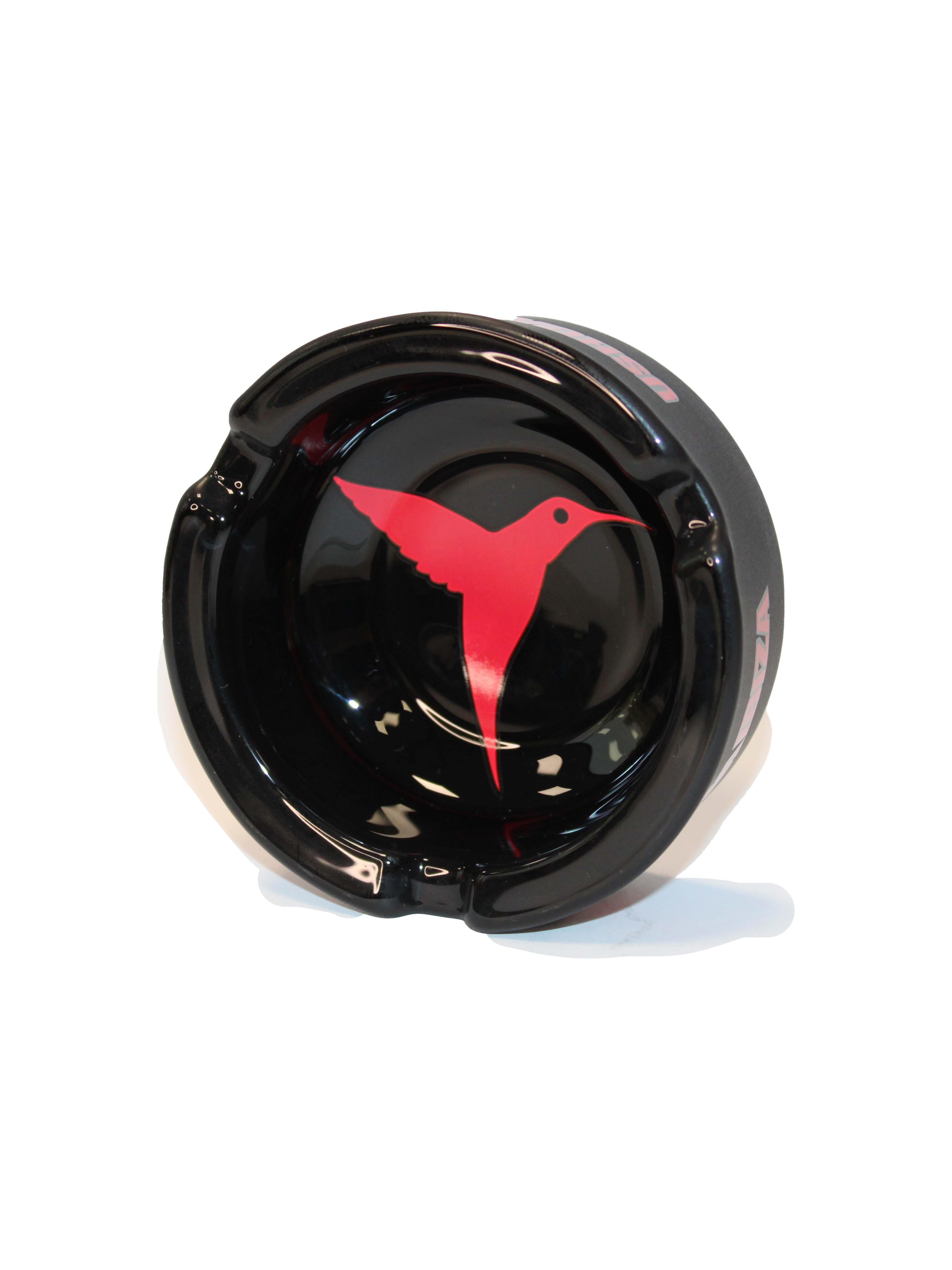 Black ceramic ashtray featuring the iconic Ushuaïa hummingbird logo in red.
Available in one size.
COMPOSITION:
high-resistance glazed ceramic.