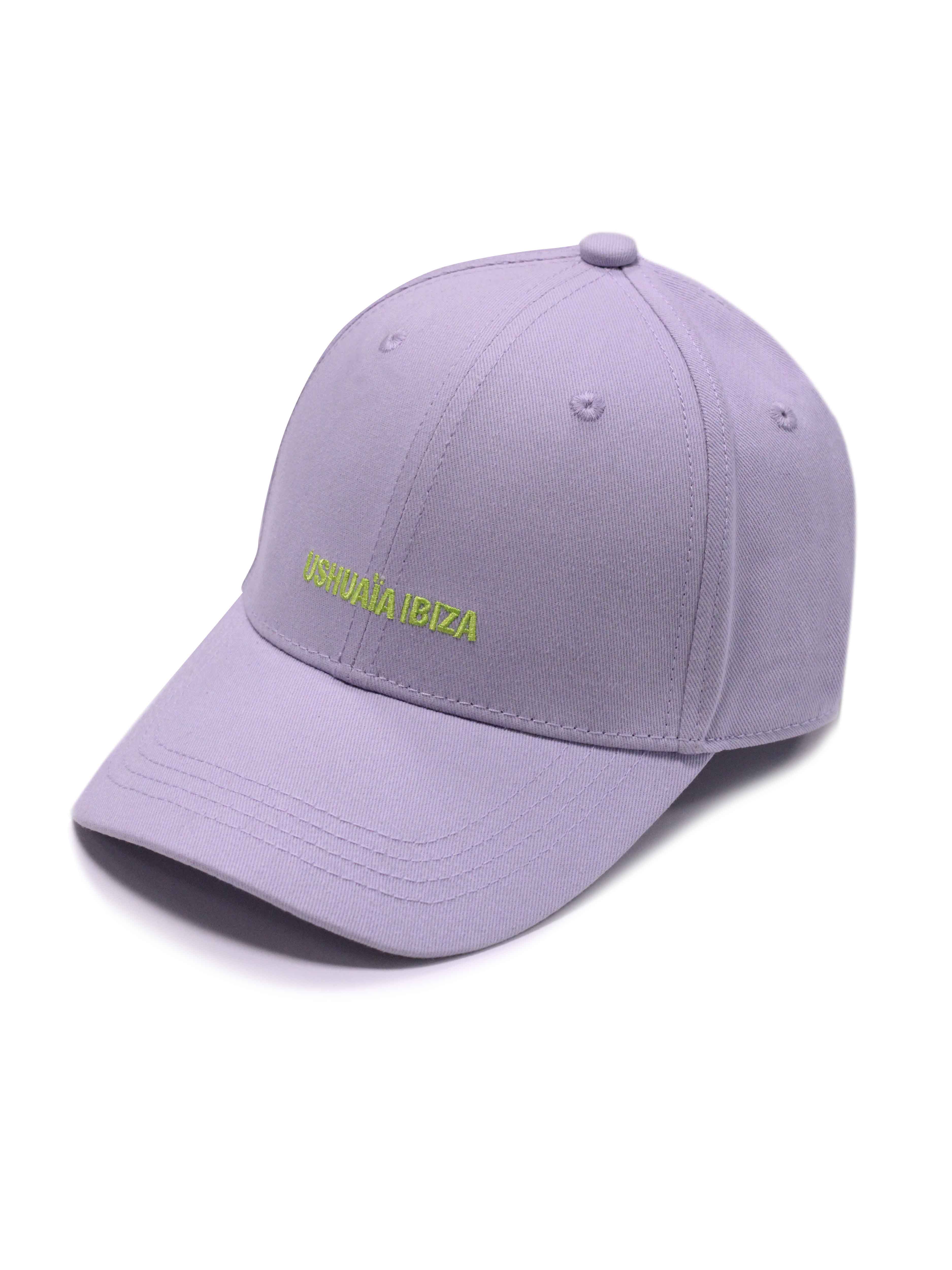 Curved visor cap in lilac with contrasting lime green Ushuaïa Ibiza embroidered logo on the front. Adjustable back strap for a comfortable fit.