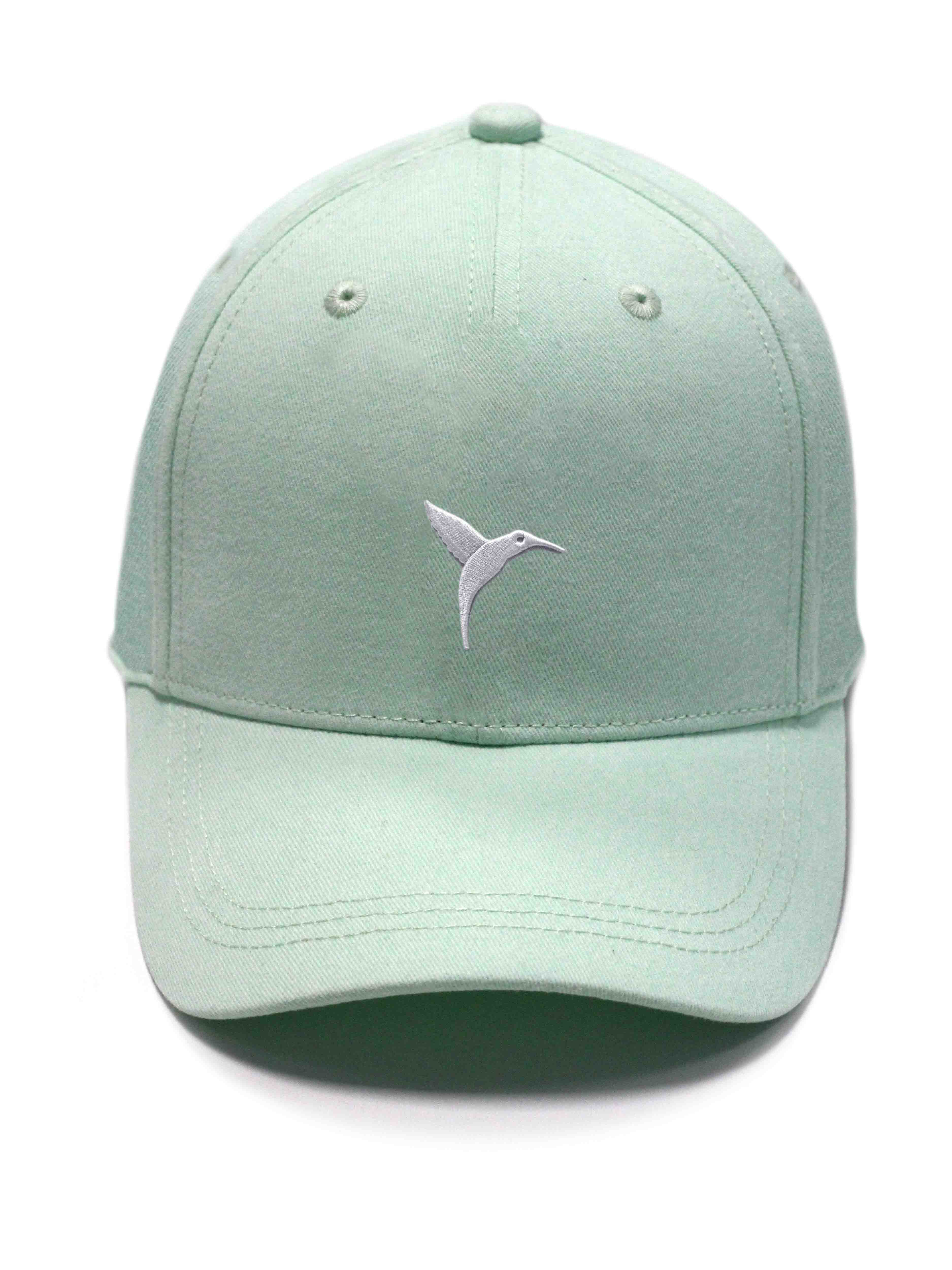 Green curved visor cap with Ushuaïa Ibiza logo embroidered in white on the front. Adjustable back strap for a comfortable fit.
