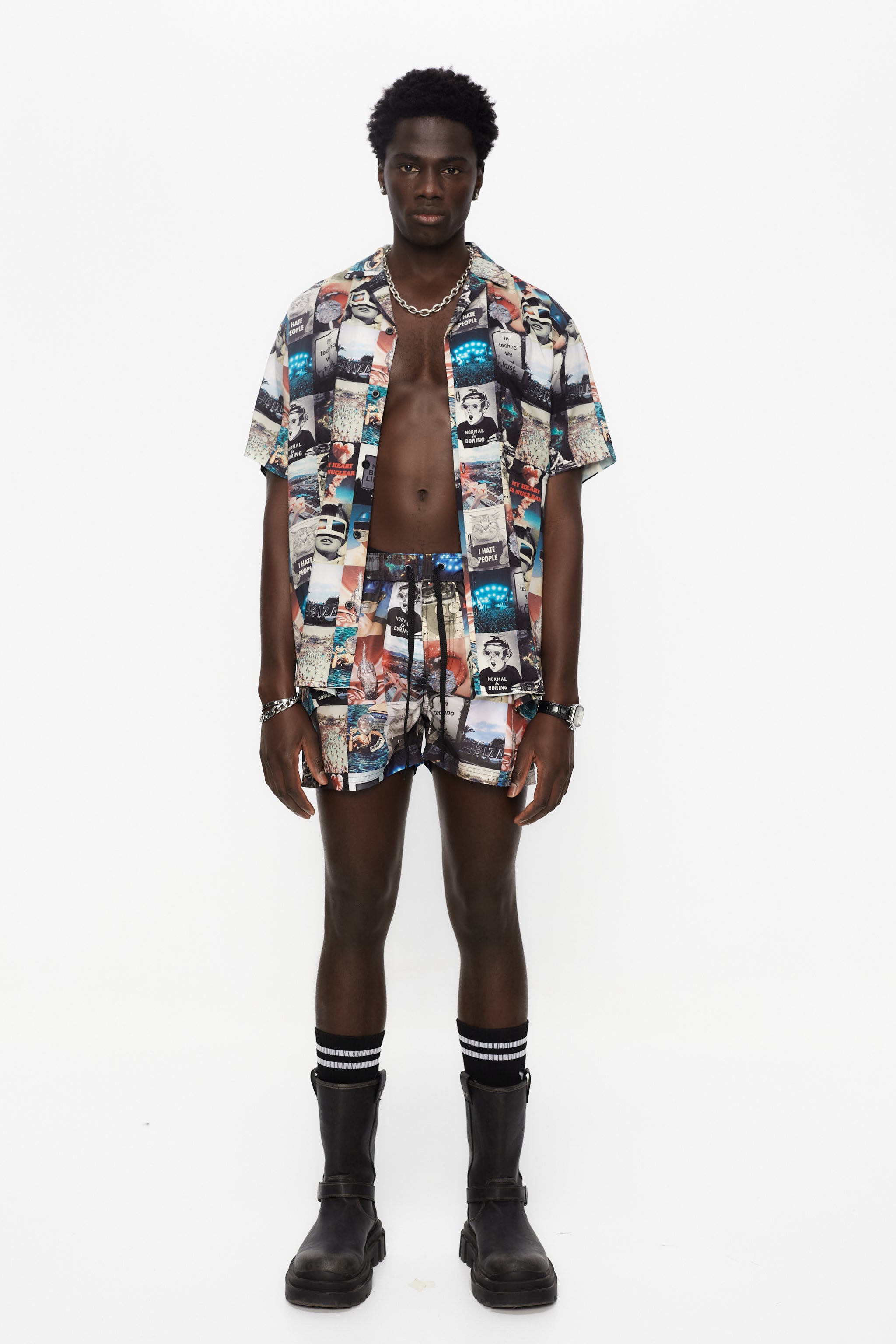 Printed shirt made of blend fabric. Lapel collar and short sleeve. Front button closure. Patch detail on the front and personalized label on the back.