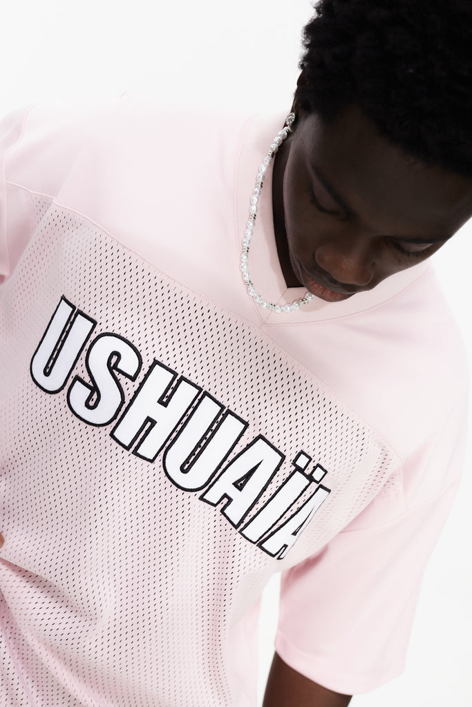 Combined rugby style t-shirt made of technical and mesh fabric, lightweight and breathable. V-neck and Short sleeves. Detail of contrasting combined applications on front and back. 