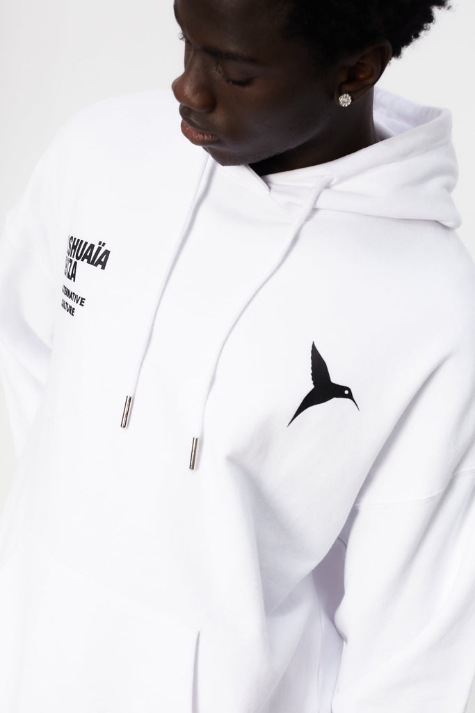 Oversized sweatshirt with adjustable hood with drawstring and washed long sleeves with peach effect. Contrast combined print detail on the front. Kangaroo pocket on the front. Ribbed finishes.