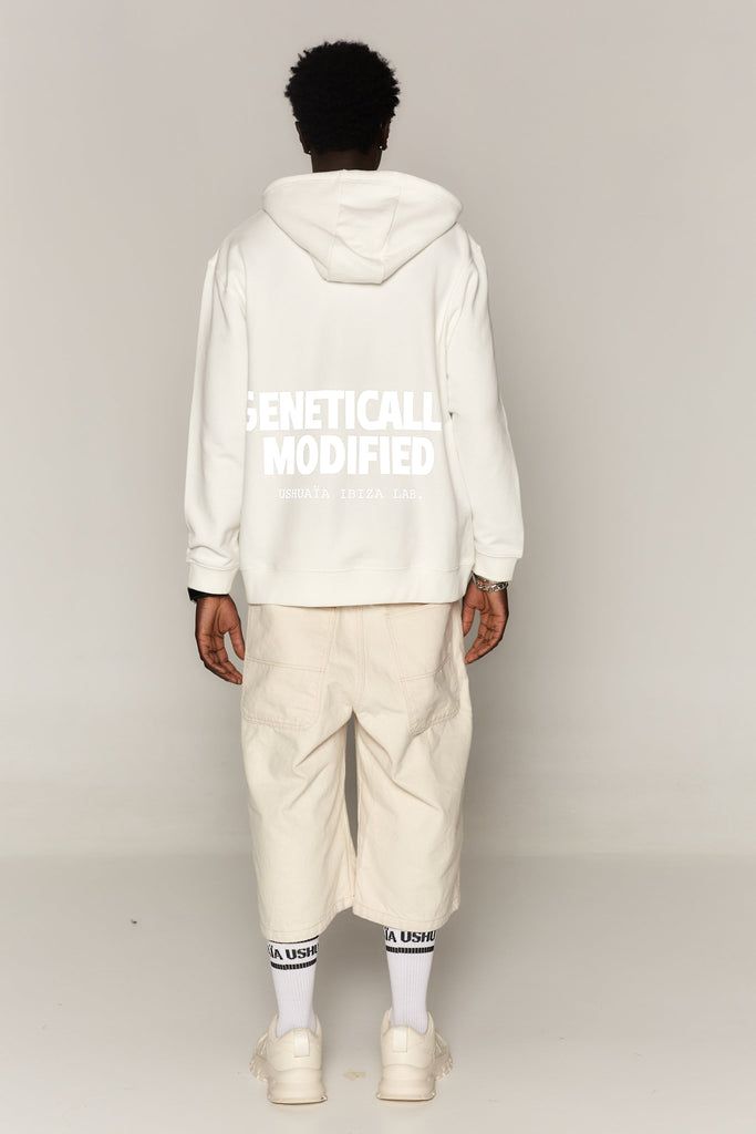 Regular zip-up sweatshirt with hood and adjustable high neck with drawstring and washed long sleeves with peach effect. Reflective print detail on front and back. Kangaroo pocket on the front. Ribbed finishes. 