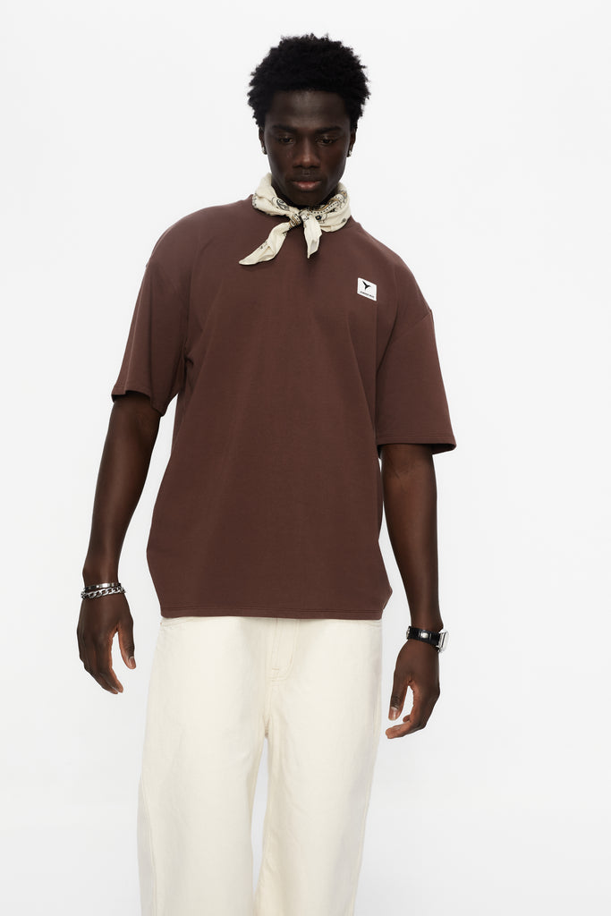 Oversized t-shirt with round neck and short sleeves. Patch detail on the front combined with contrast with print on the back.
LIMITED EDITION